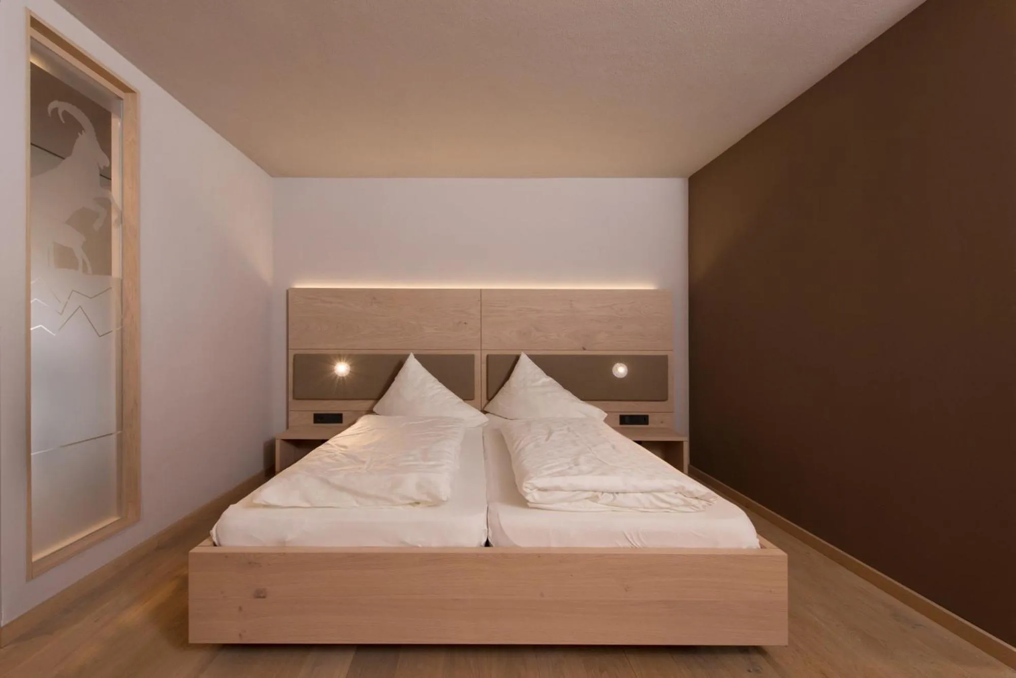 Bed in Familotel Alphotel