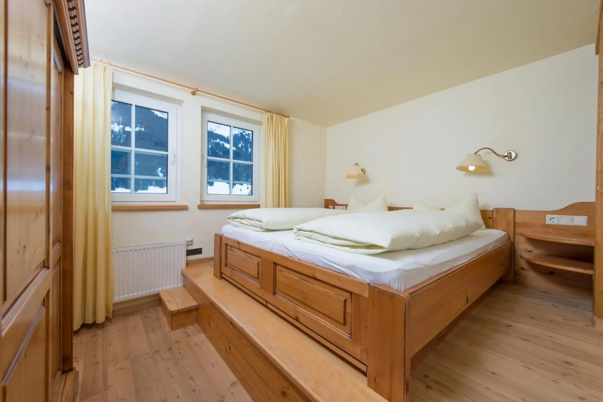 Bed in Familotel Alphotel