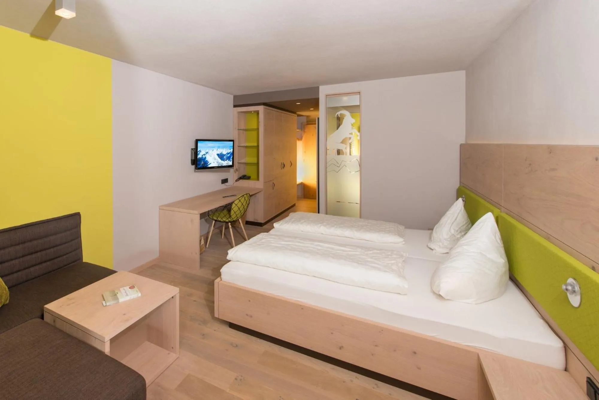 Bed in Familotel Alphotel