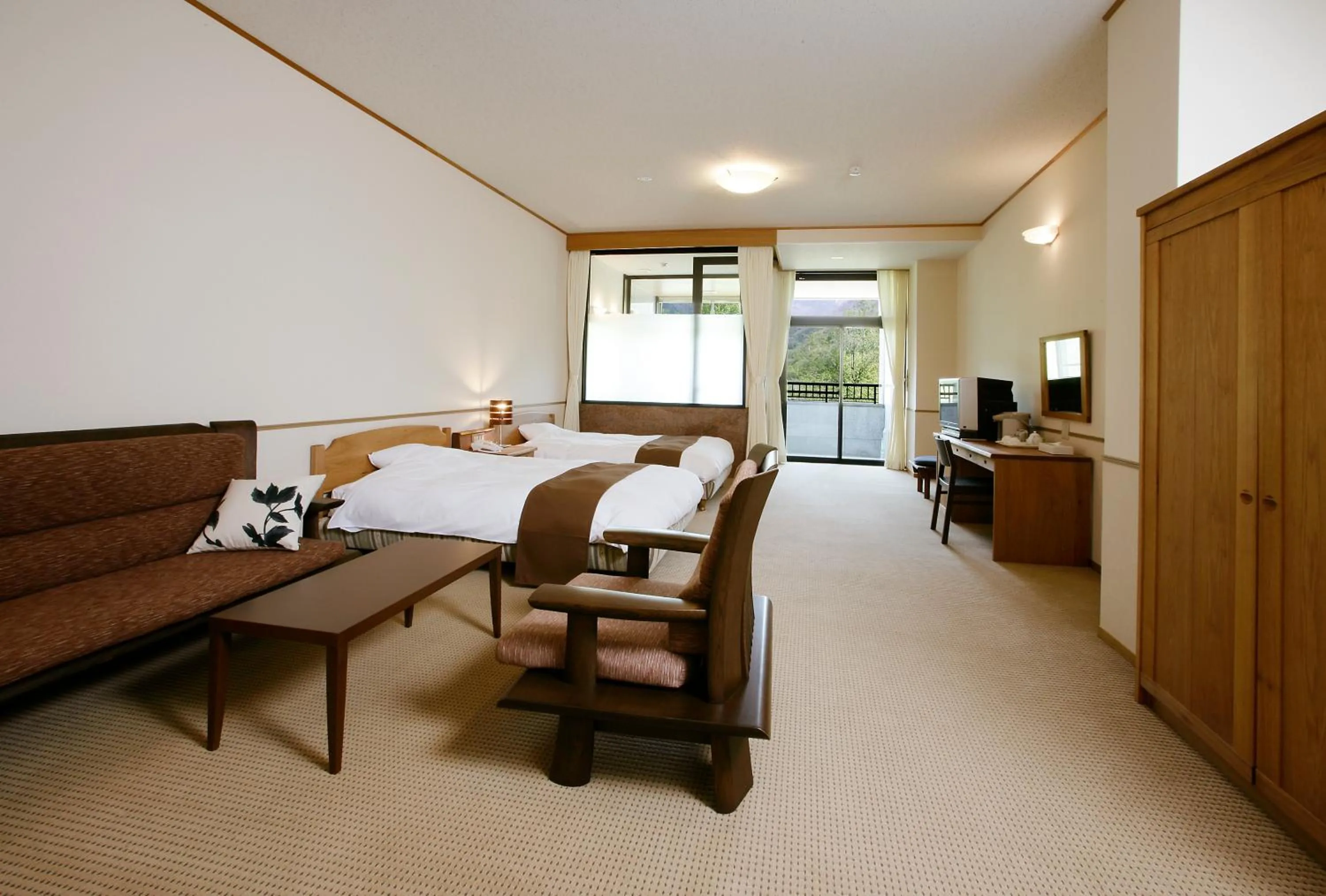 Living room, Bed in Nakao Kogen Hotel Kazaguruma