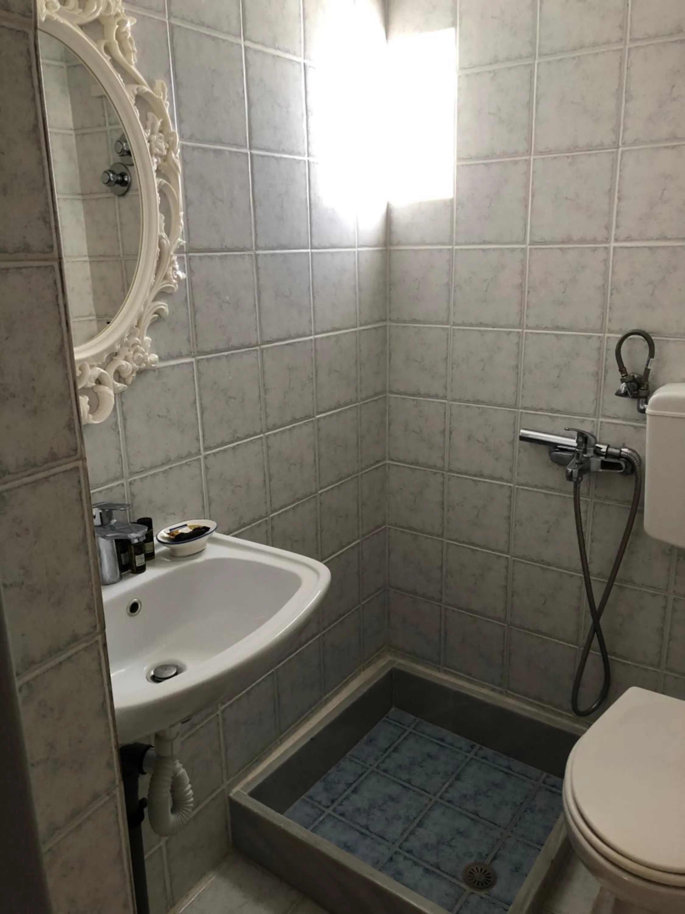 Toilet in Afrodete Hotel