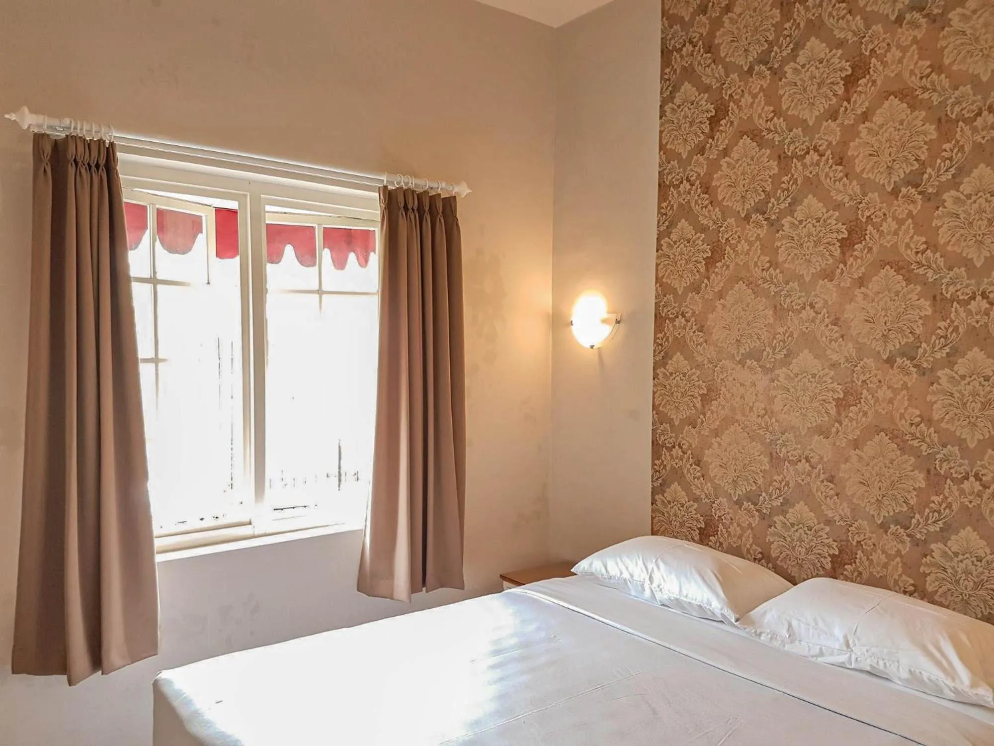 Bed in Rosetta Homestay