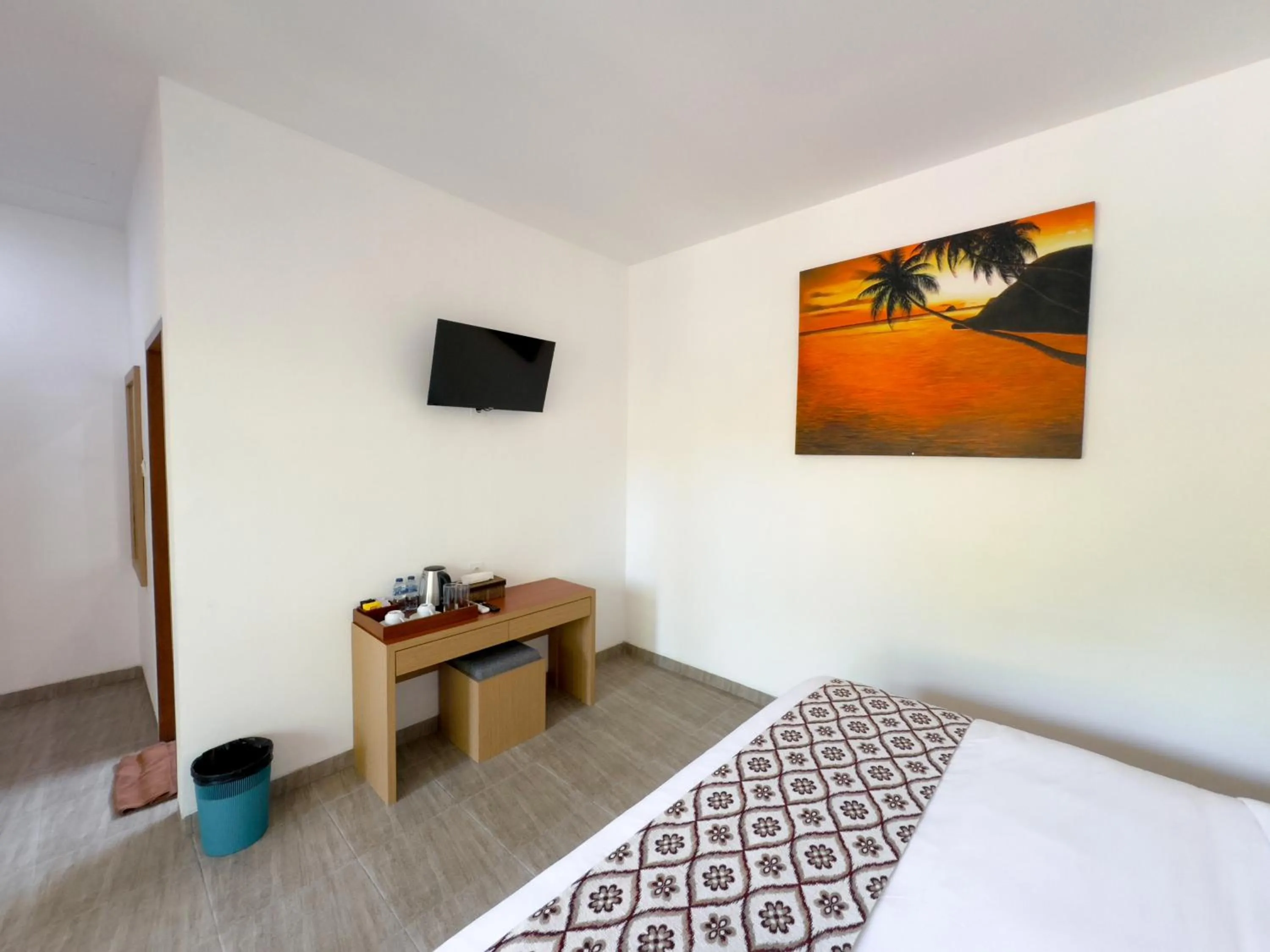 Bed in Batu Kandik Homestay