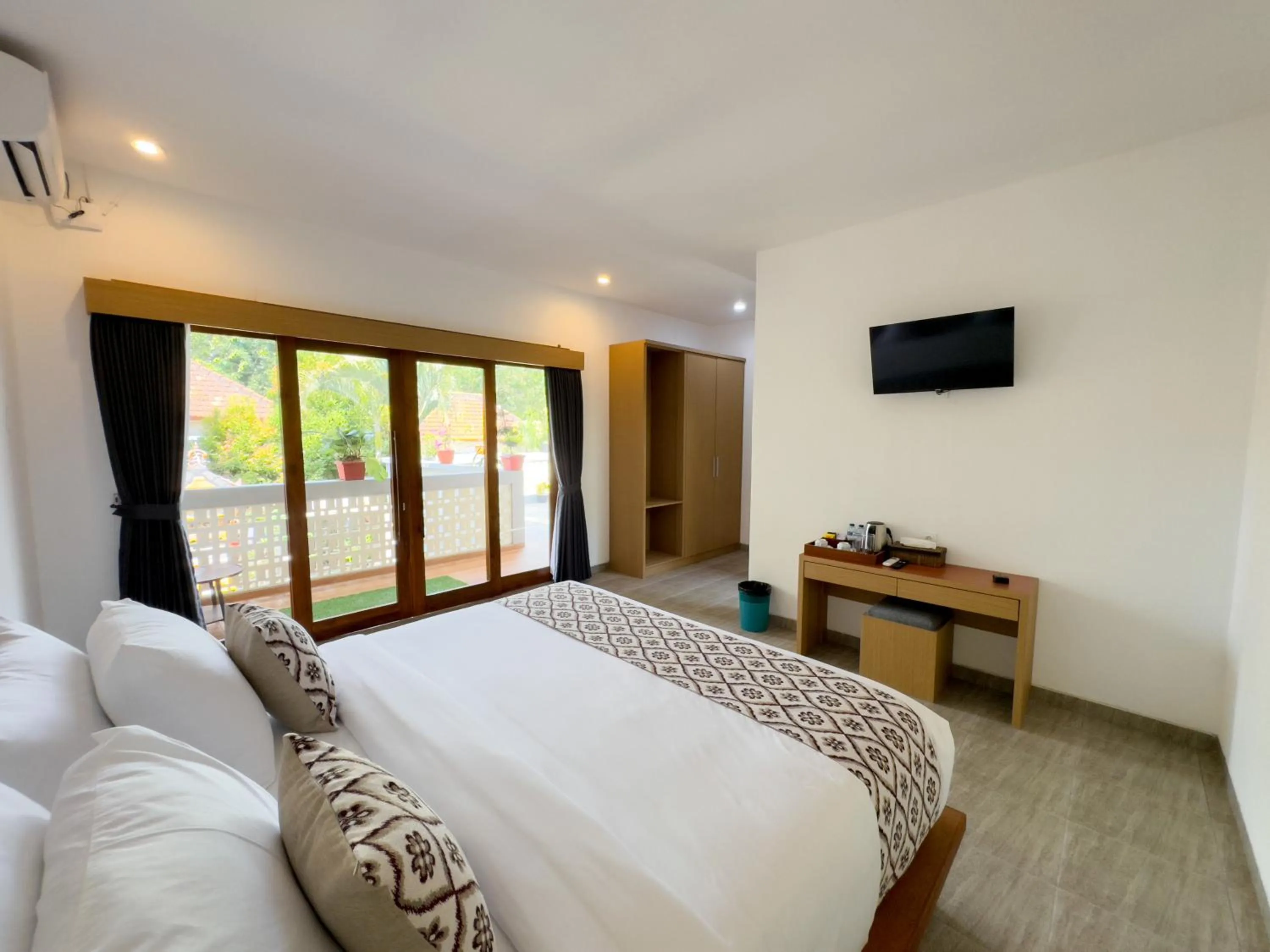 Bed in Batu Kandik Homestay