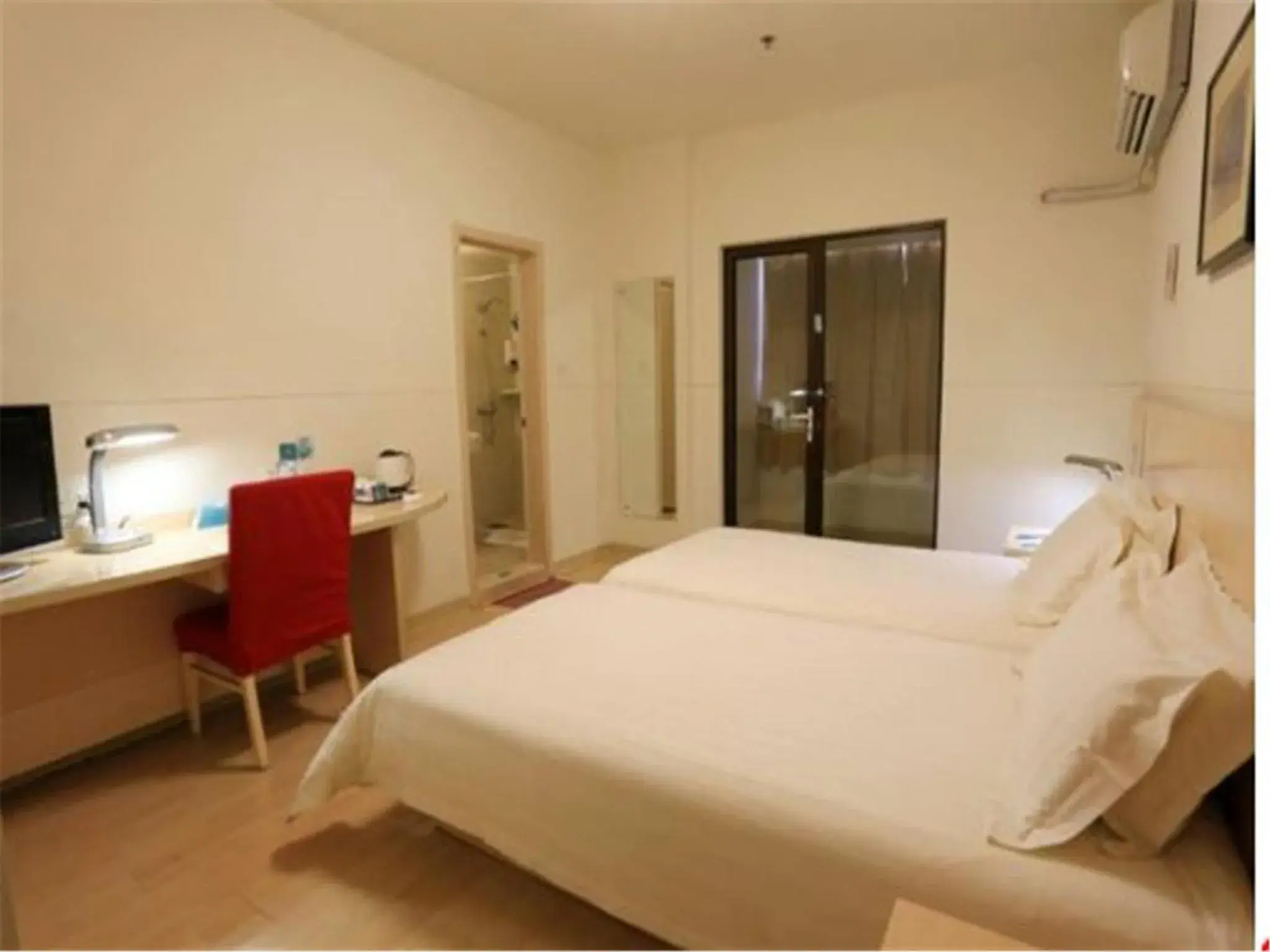 Bed in Jinjiang Inn - Qingdao Zhongshan Road Bed in Jinjiang Inn - Qingdao Zhongshan Road