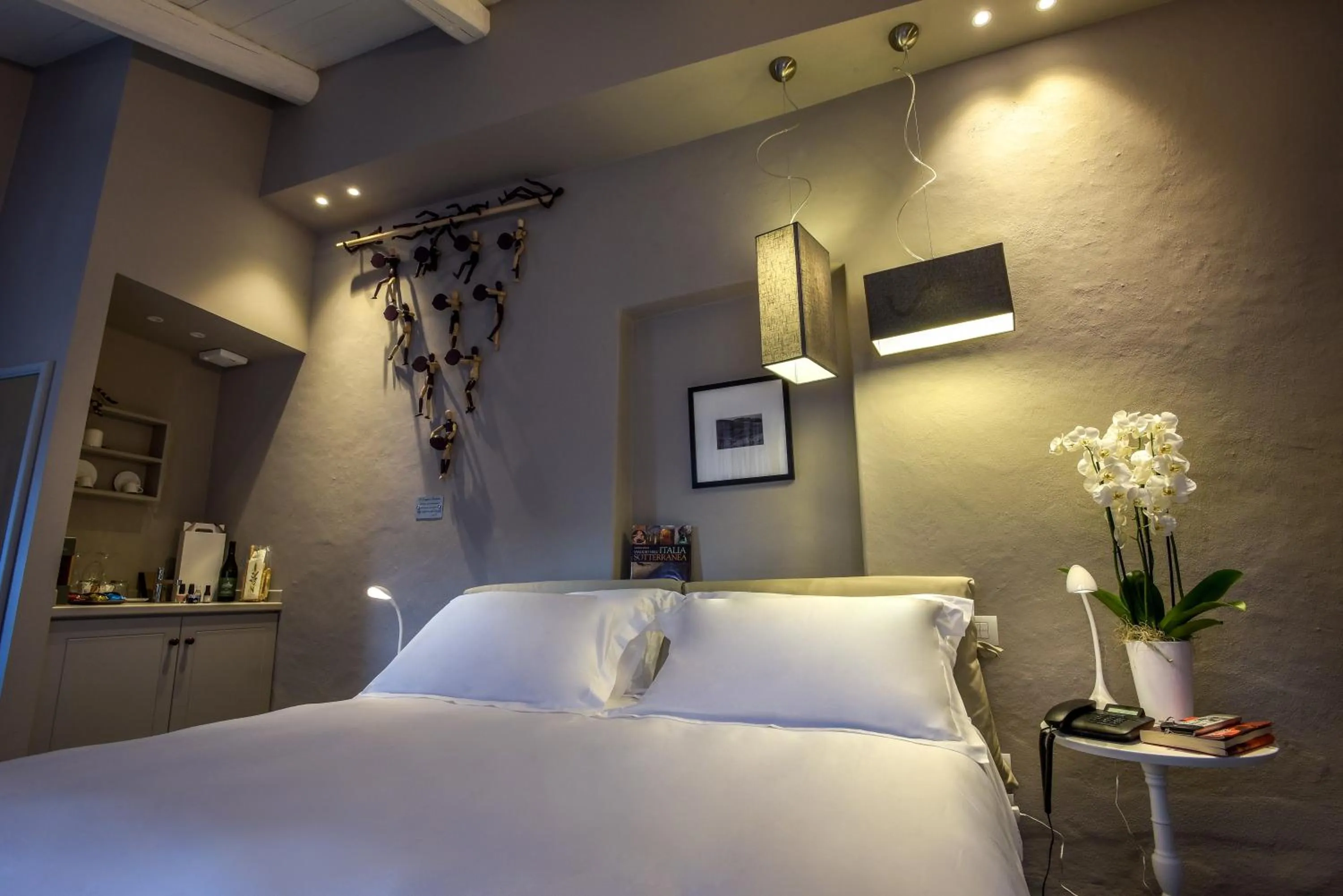 Bed in Uve Rooms & Wine Bar