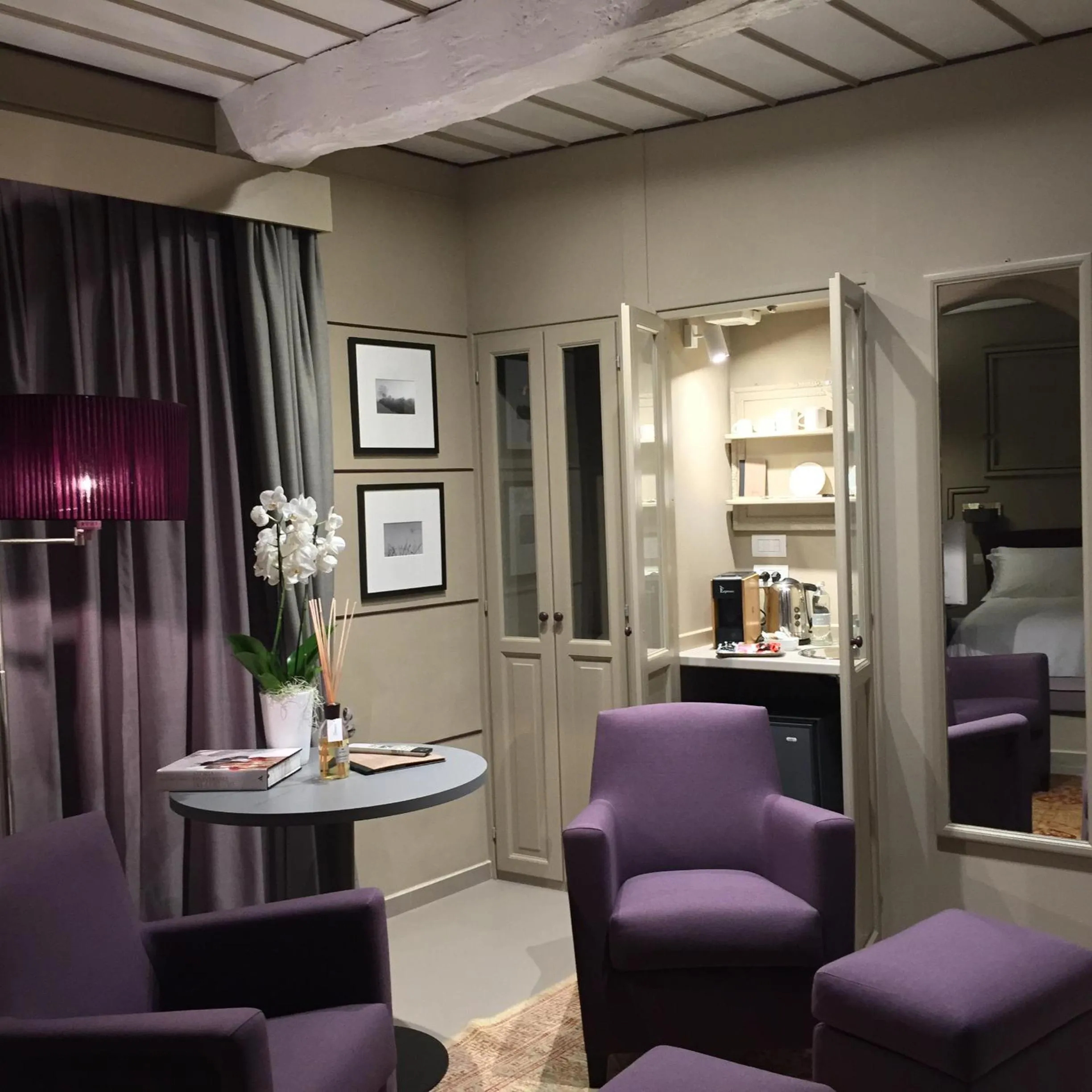 Seating area in Uve Rooms & Wine Bar