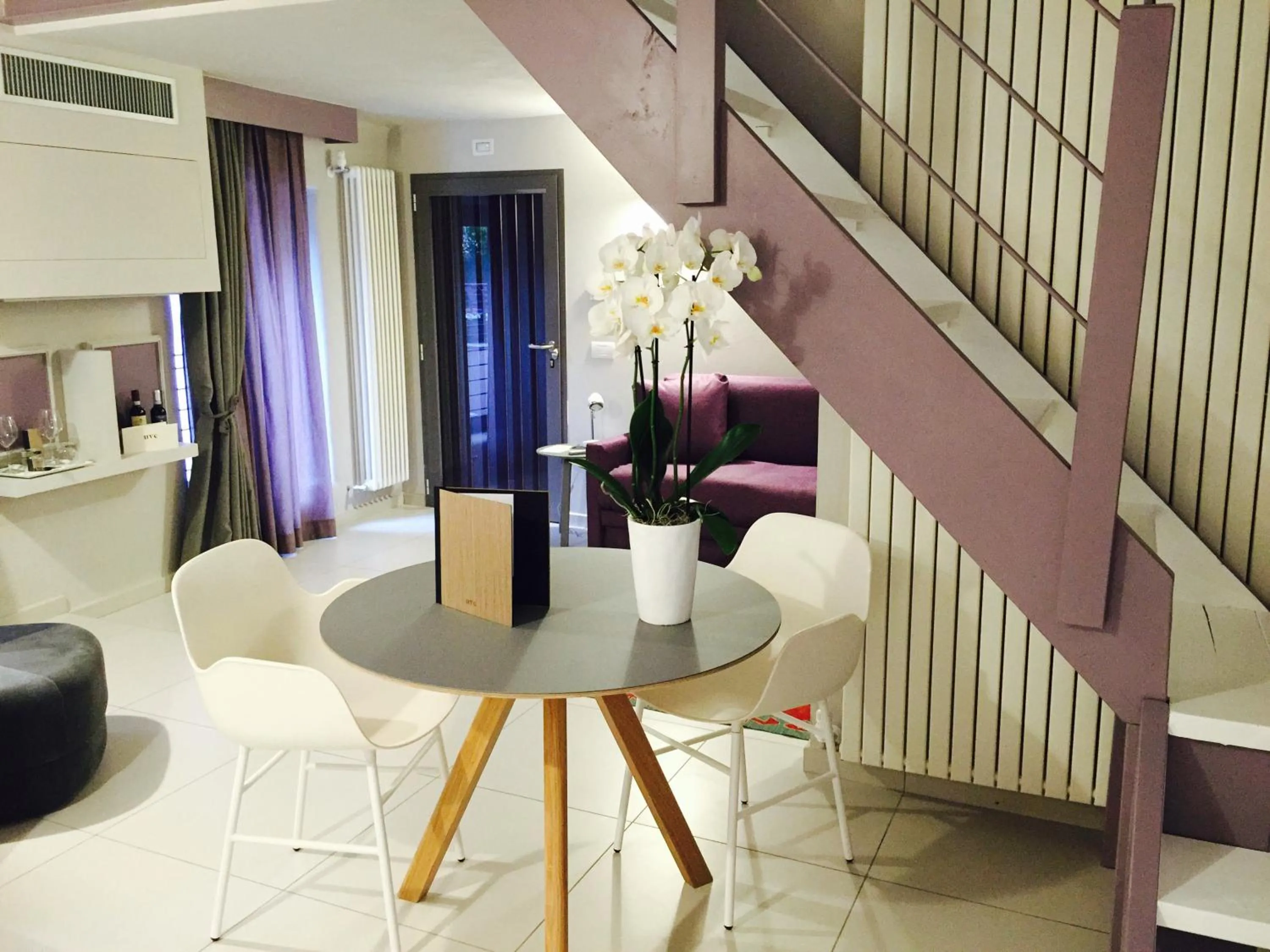 Seating area in Uve Rooms & Wine Bar