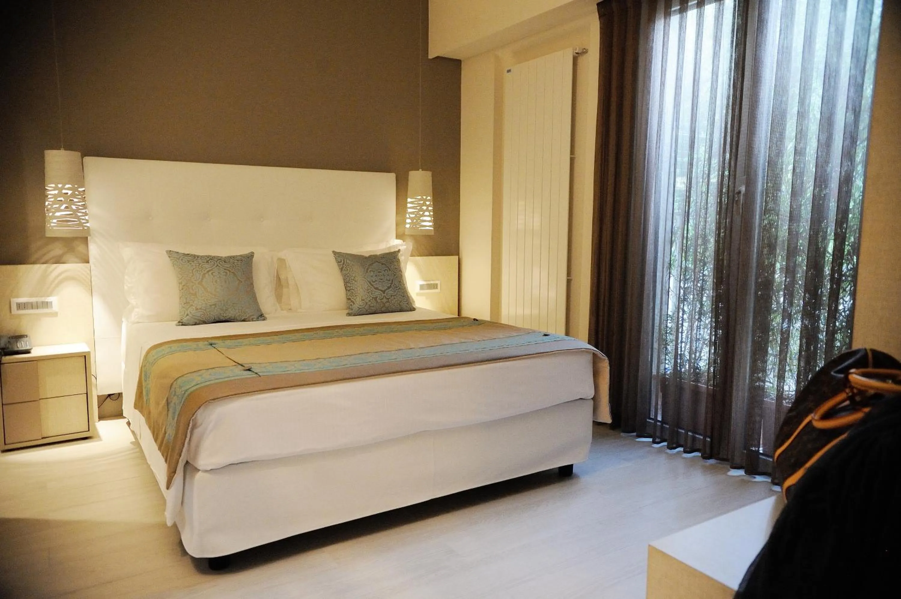 Bed in Hotel Ariston & Apartments