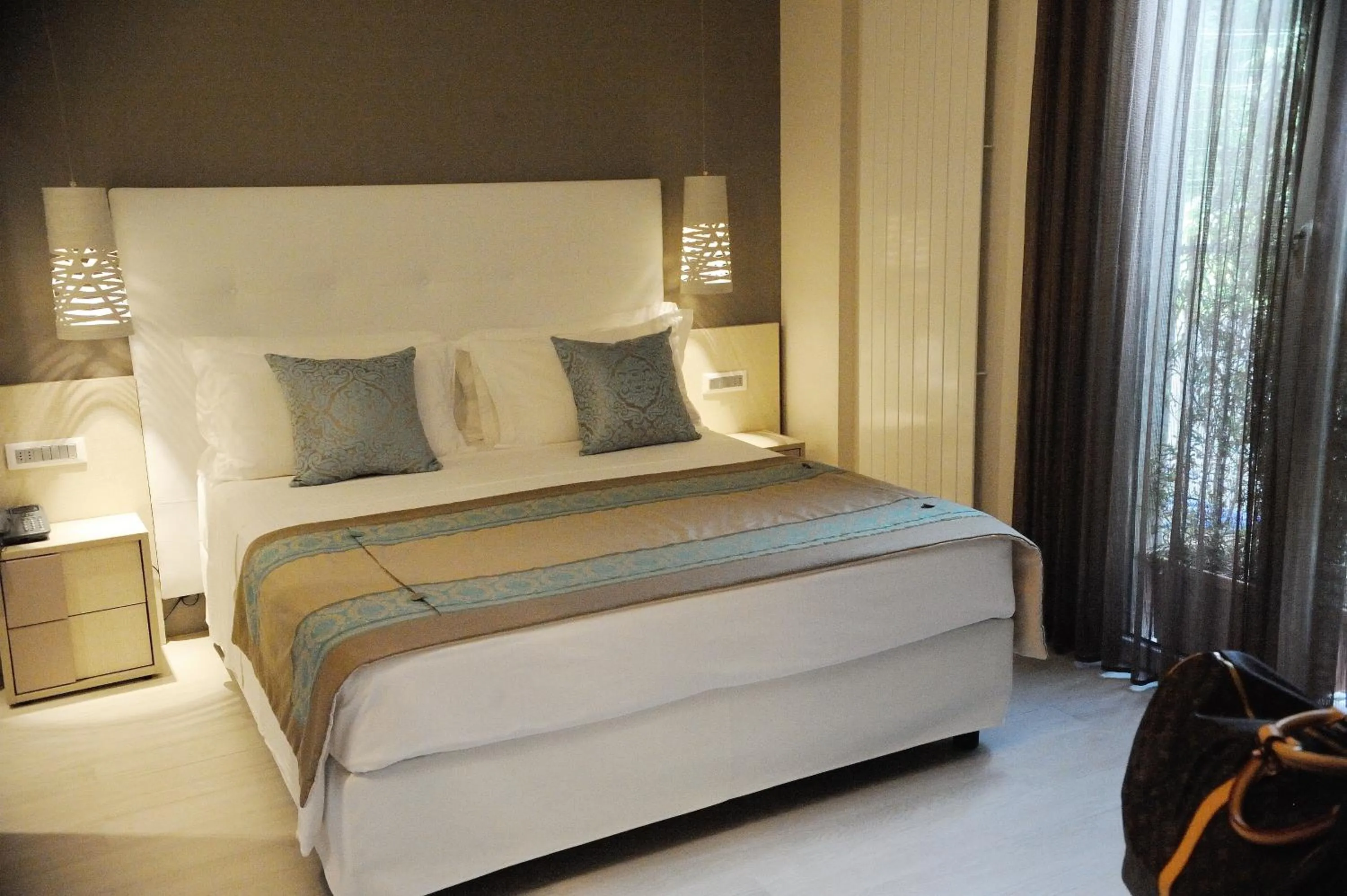 Bed in Hotel Ariston & Apartments