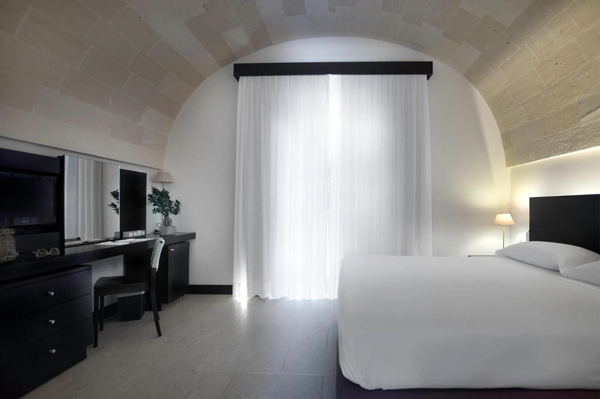 Photo of the whole room, Bed in Masseria Bagnara Resort & Spa