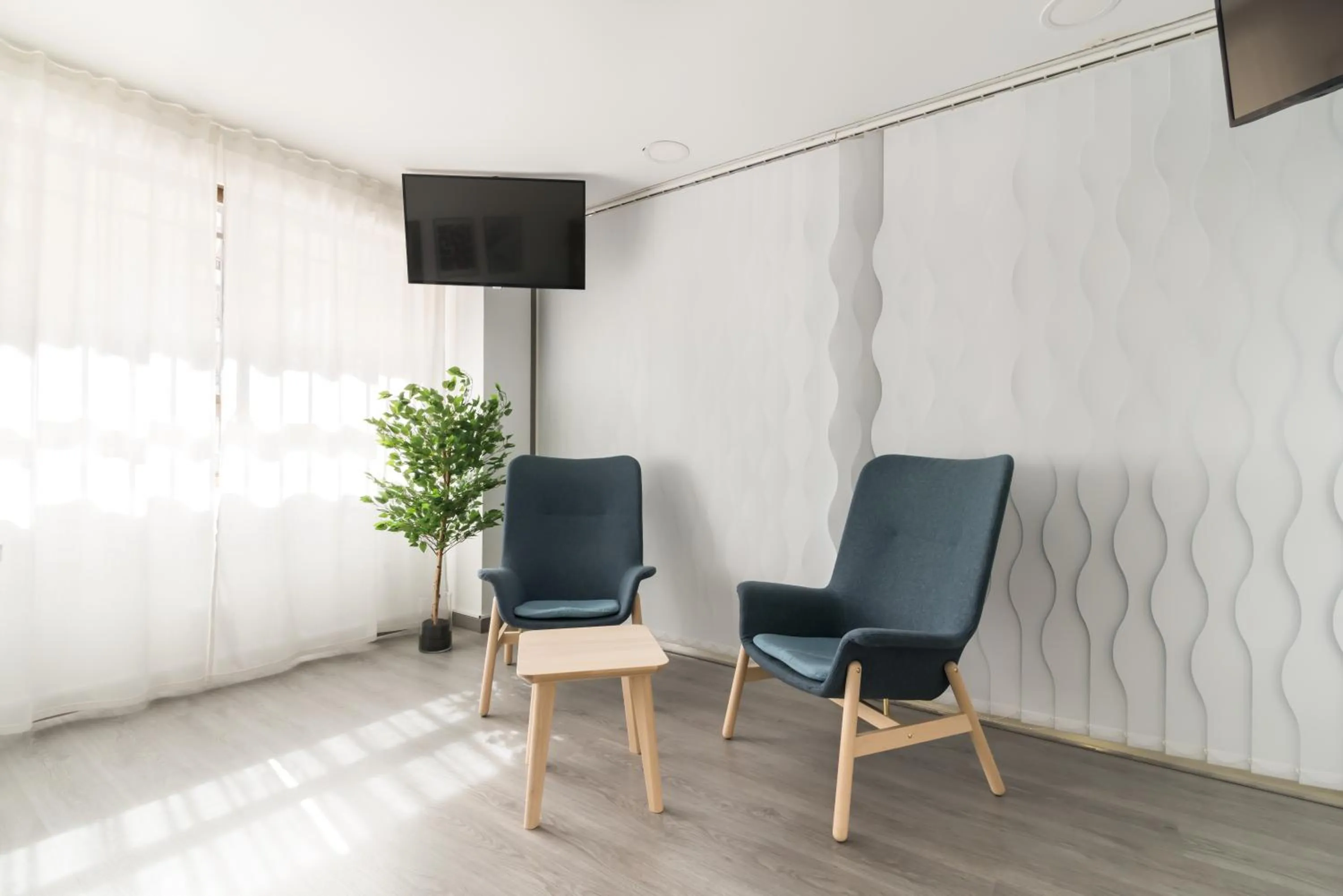 Communal lounge/ TV room in Roisa Hostal Boutique