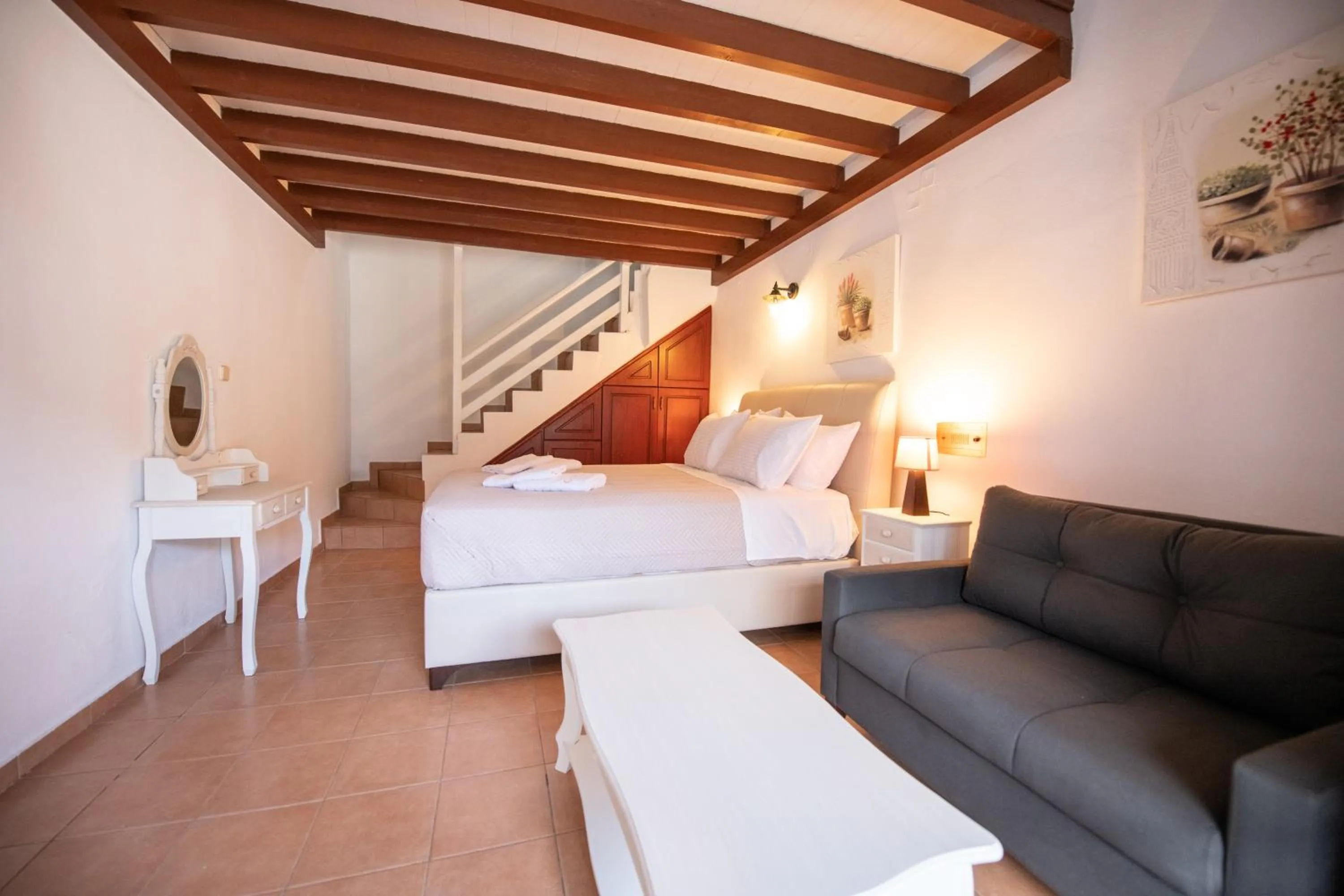 Bed in Hovolo Hotel Apartments