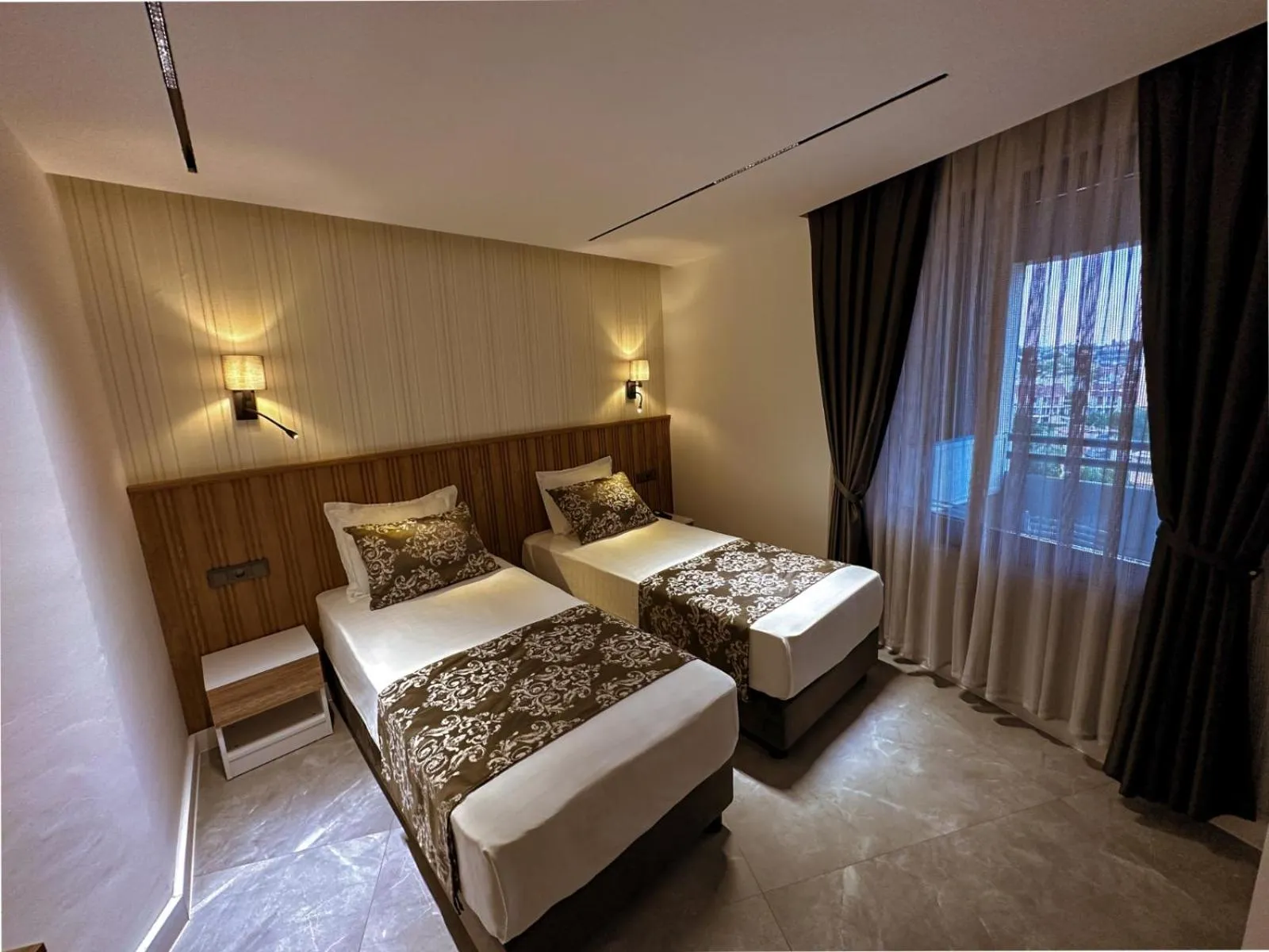 Bed in Happy Apart Hotel