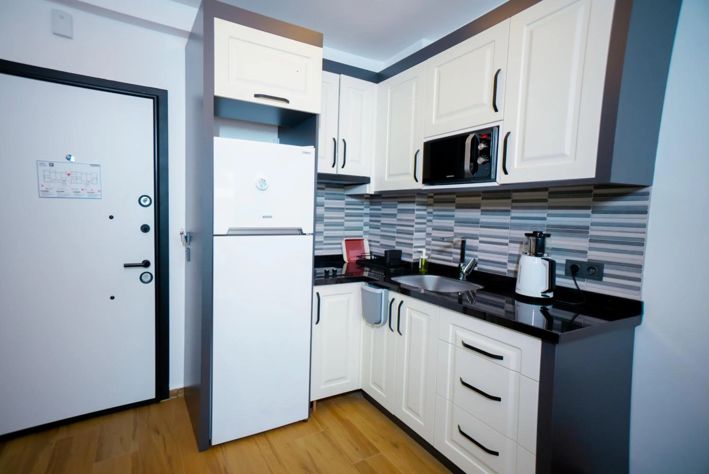 Kitchen or kitchenette in Sweet Home Kemer Apartments