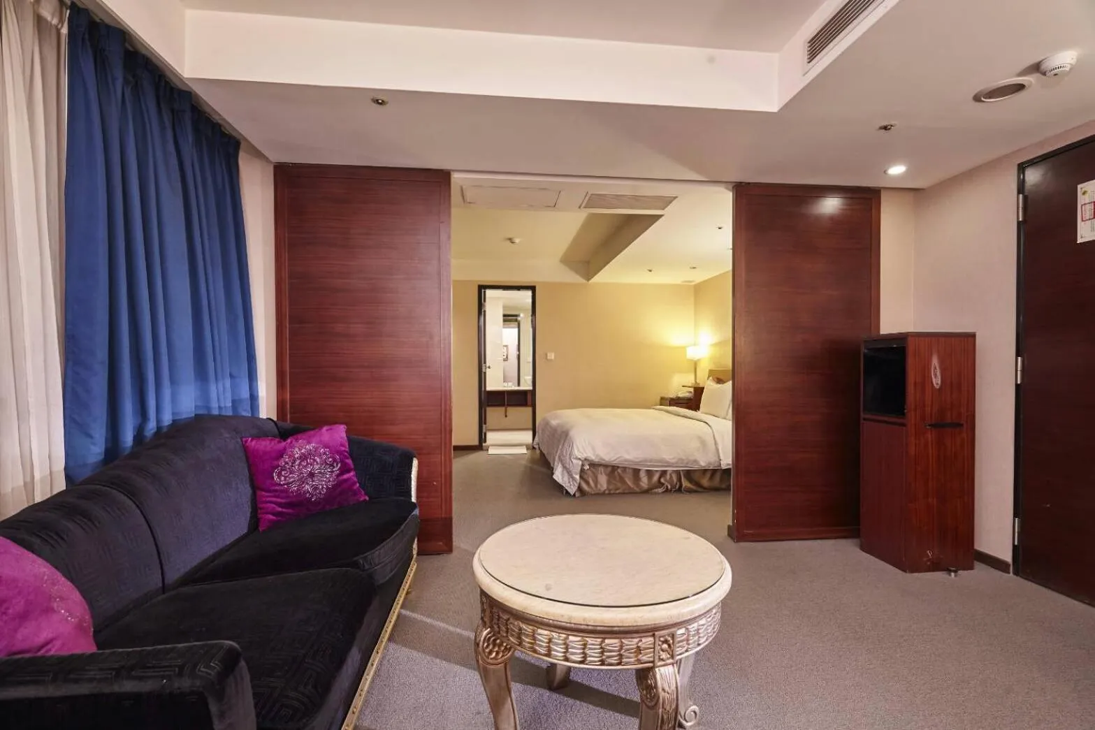 Bed in Family Hotel Taipei