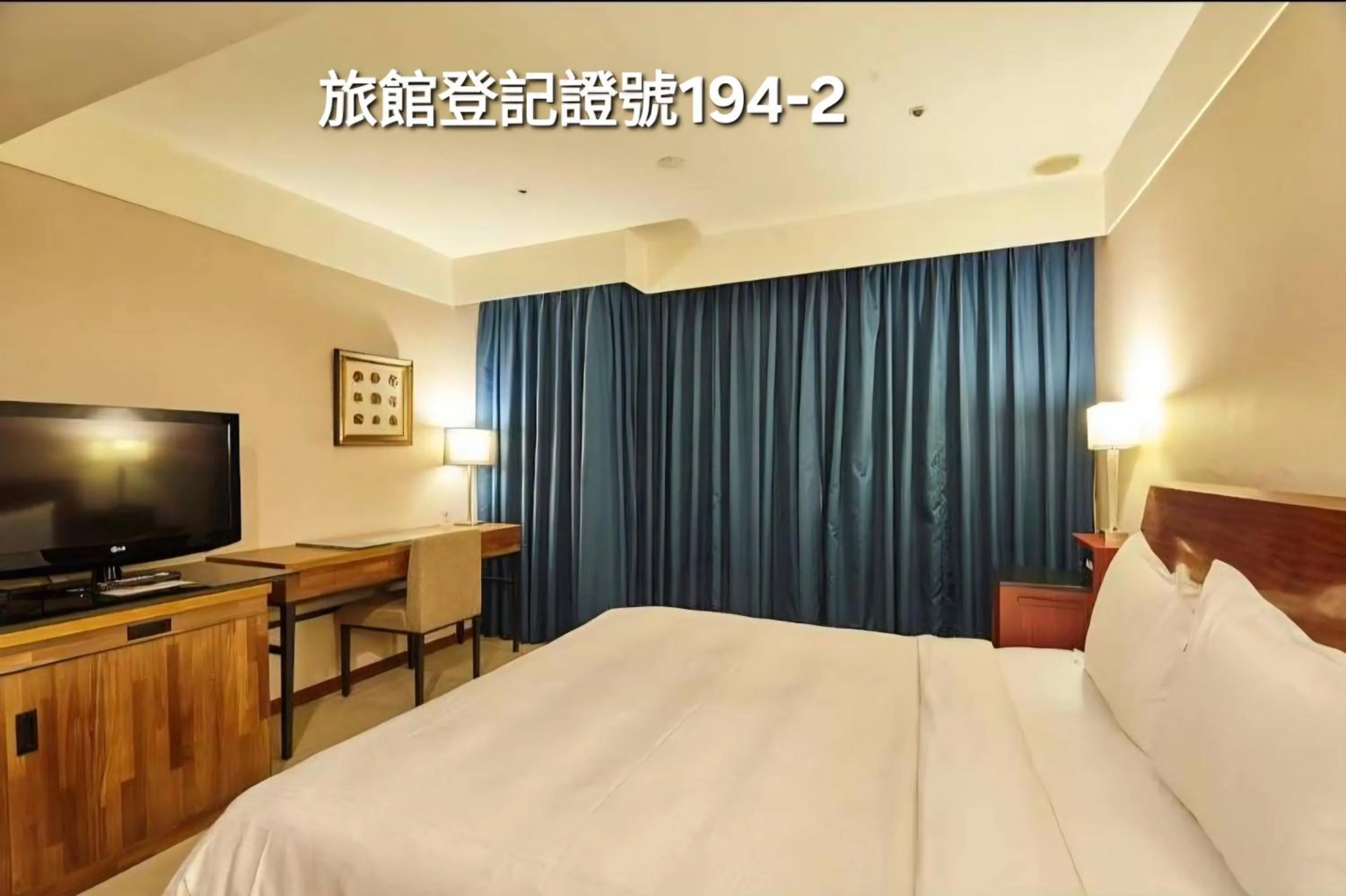 Bed in Family Hotel Taipei
