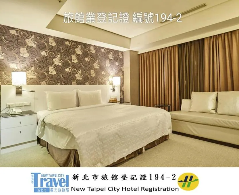 Bed in Family Hotel Taipei