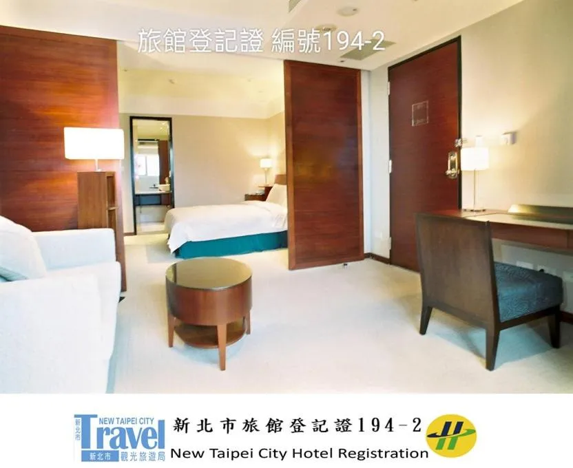 Bed in Family Hotel Taipei