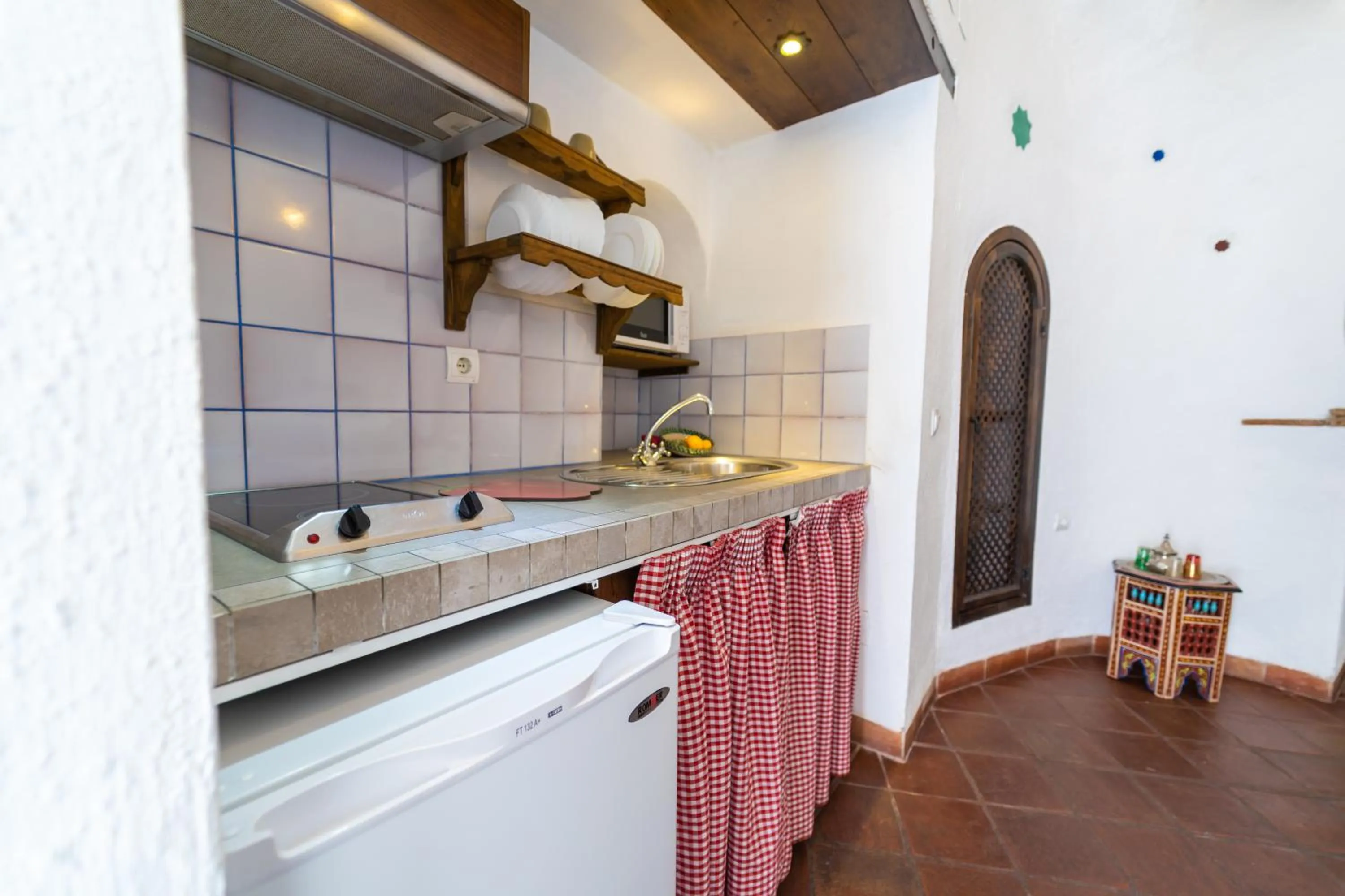 Kitchen or kitchenette in Apartamentos Montesclaros