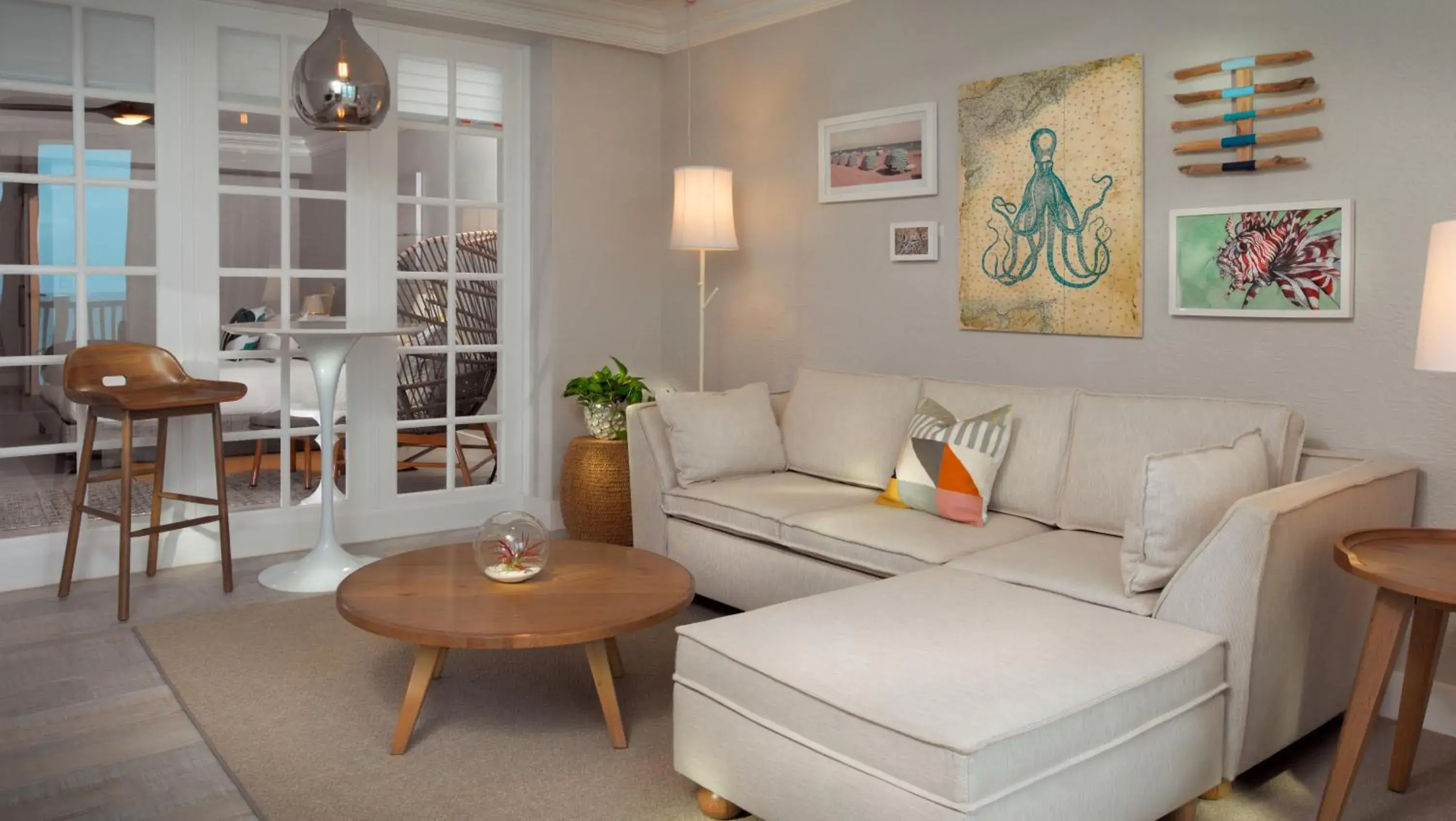 Living room in Pelican Grand Beach Resort, a Noble House Resort Living room in Pelican Grand Beach Resort, a Noble House Resort