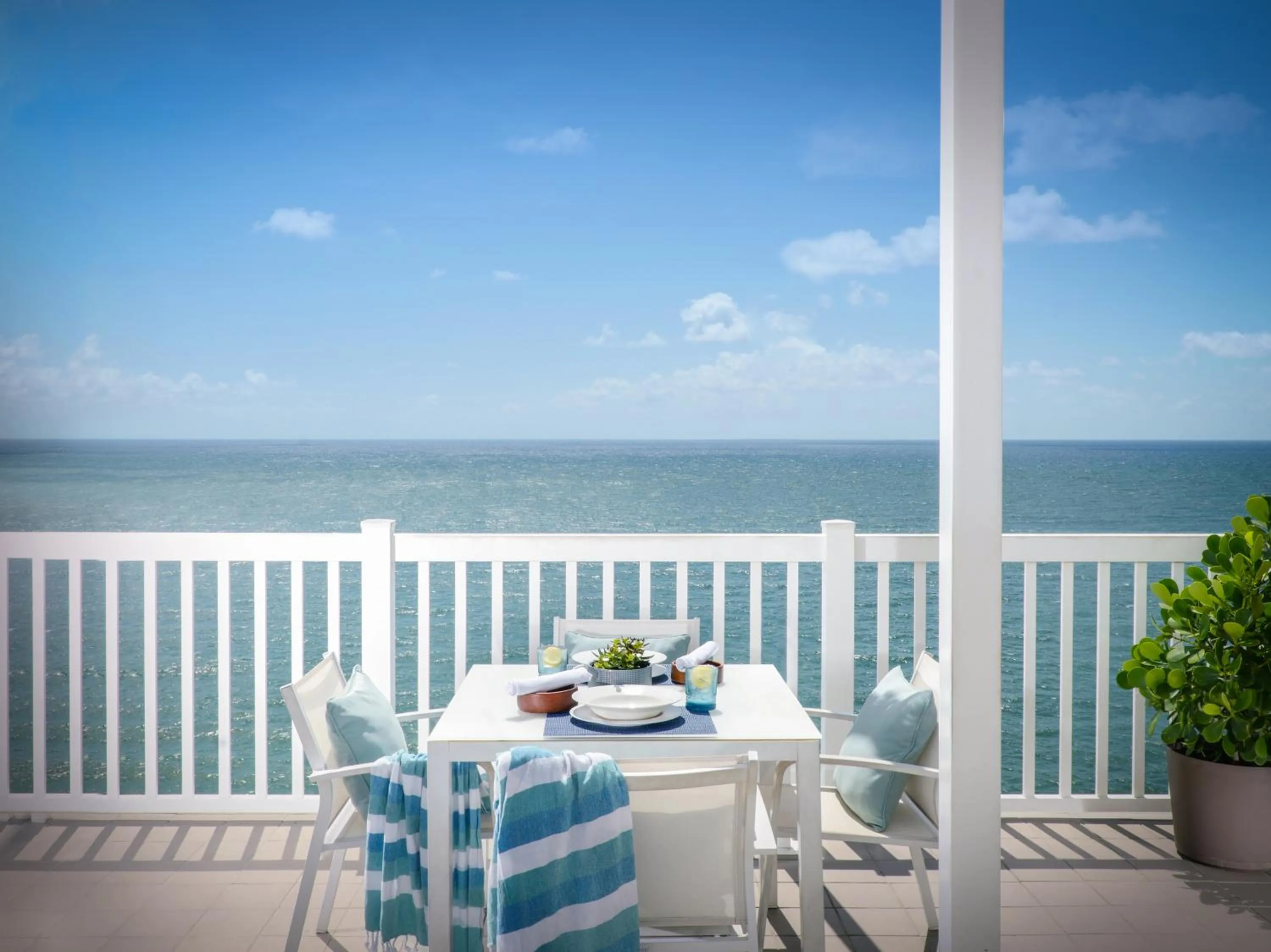 Patio in Pelican Grand Beach Resort, a Noble House Resort