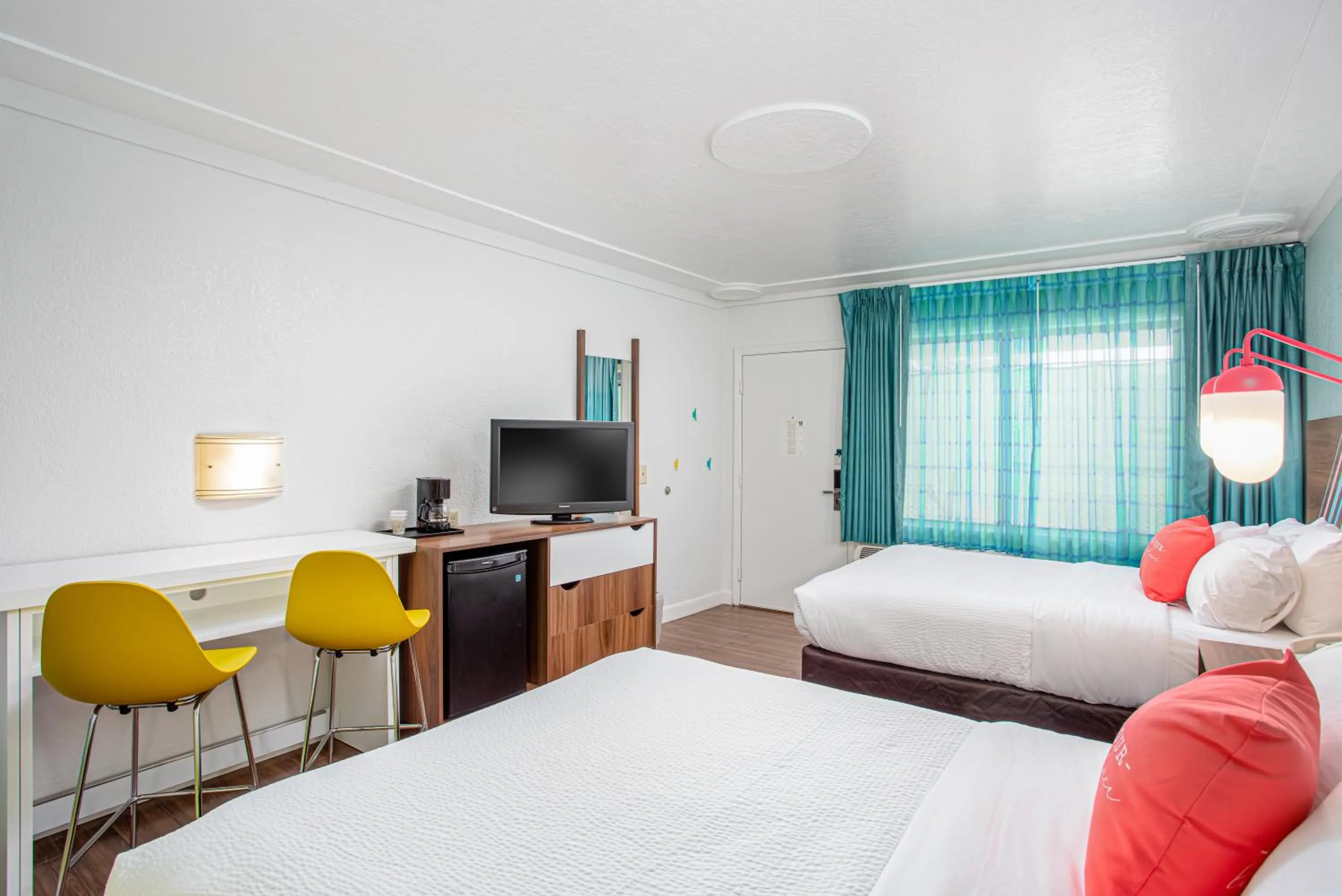 Bed in Beachside Hotel & Suites Cocoa Beach - Port Canaveral