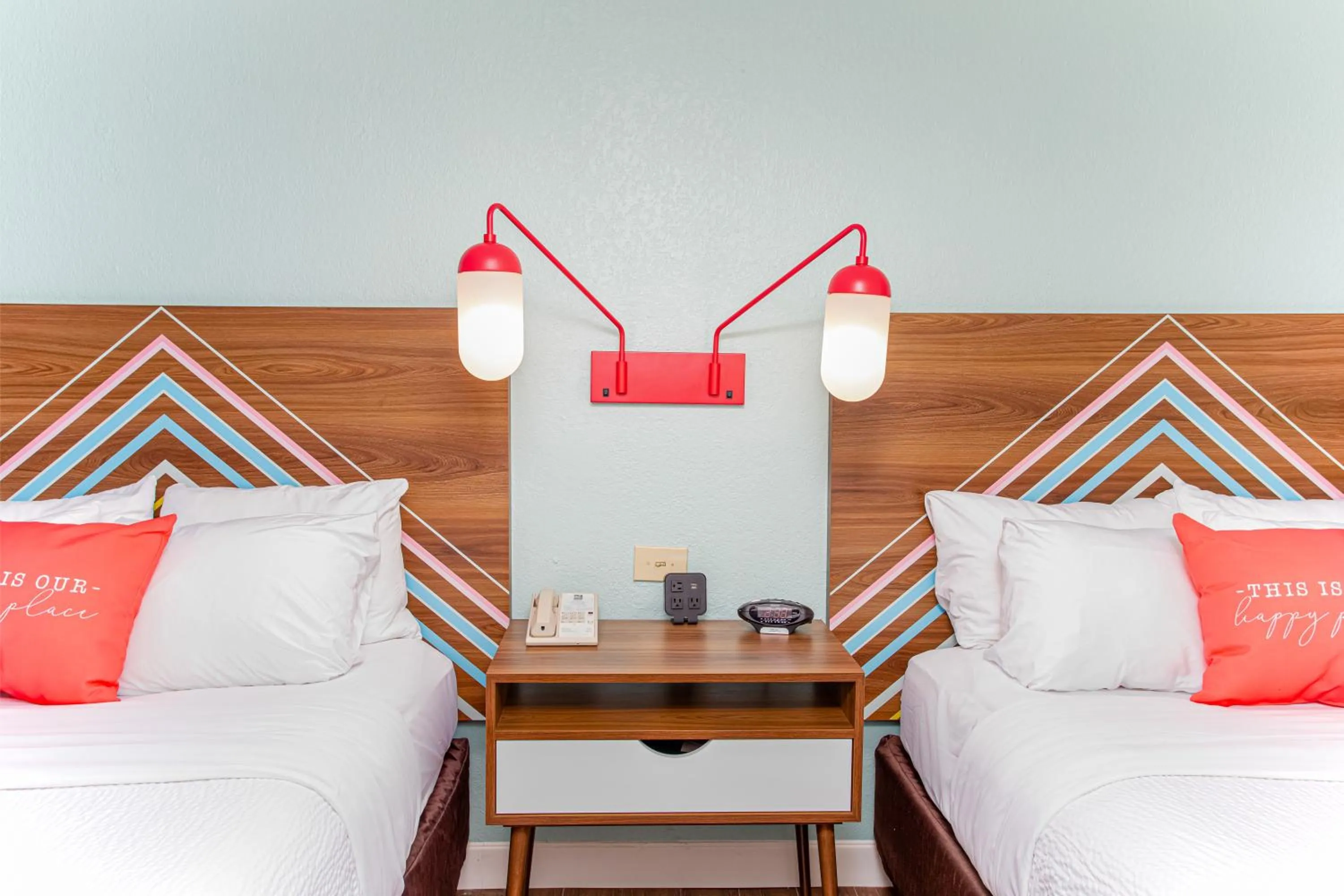 Bed in Beachside Hotel & Suites Cocoa Beach - Port Canaveral