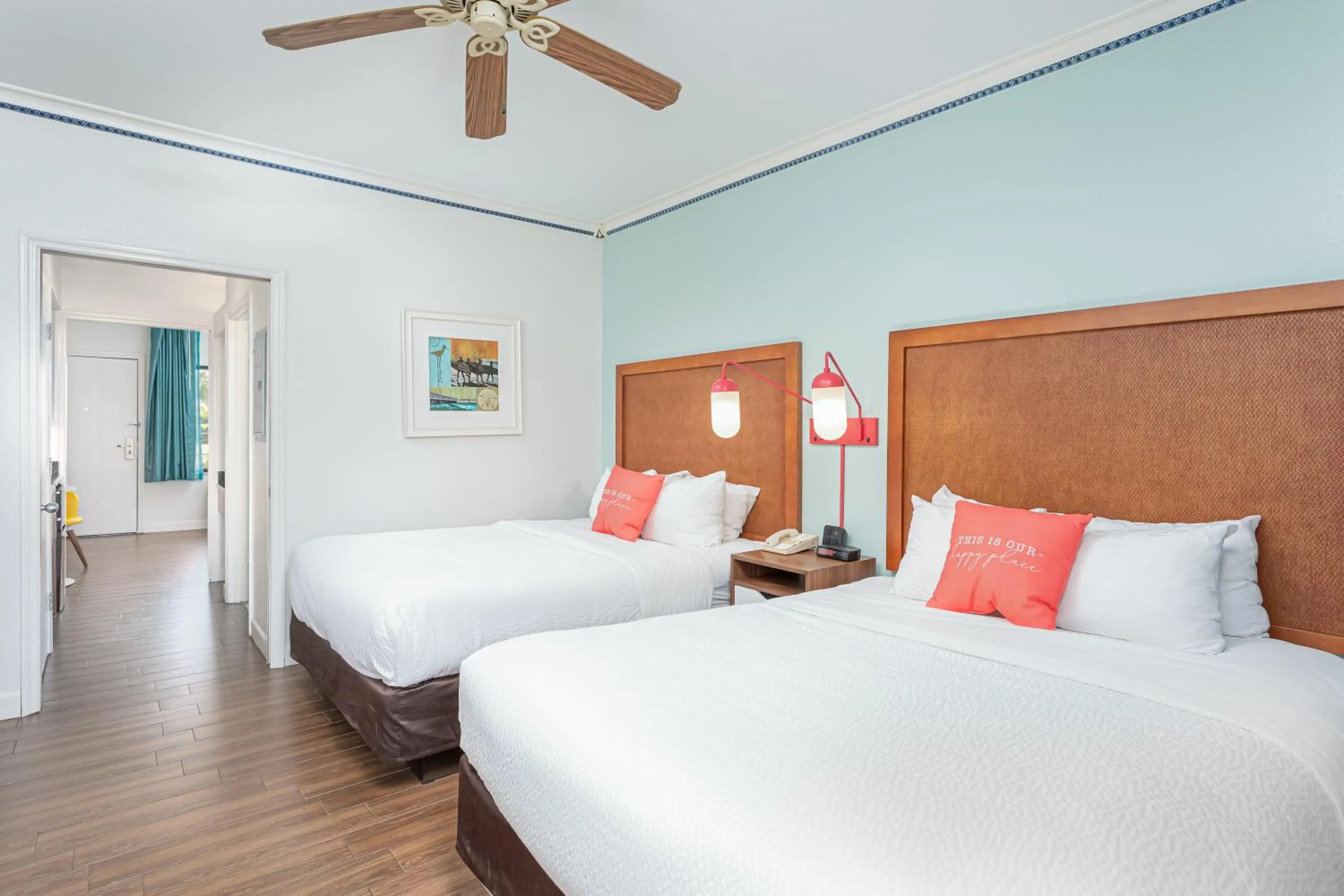 Bed in Beachside Hotel & Suites Cocoa Beach - Port Canaveral