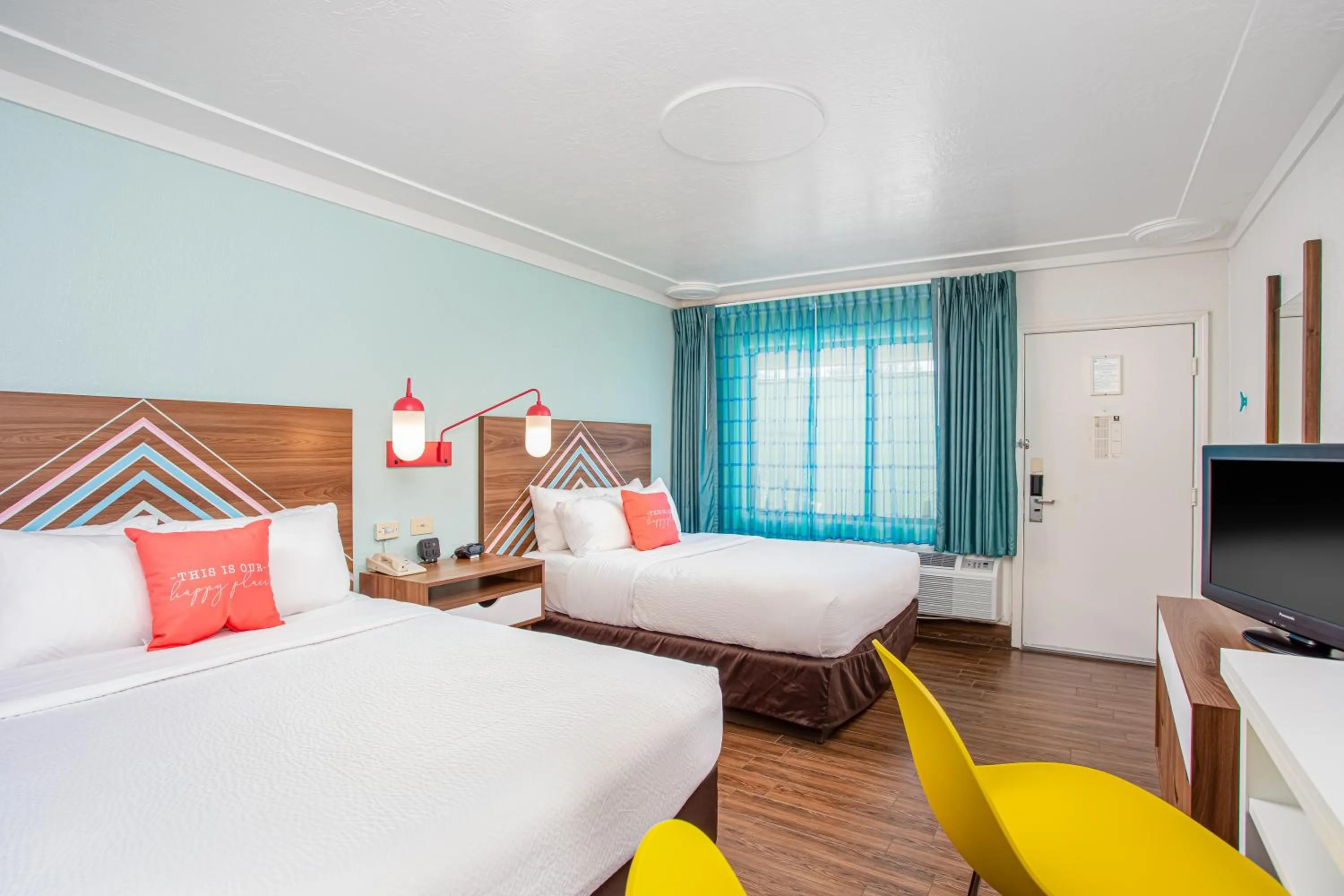 Bed in Beachside Hotel & Suites Cocoa Beach - Port Canaveral