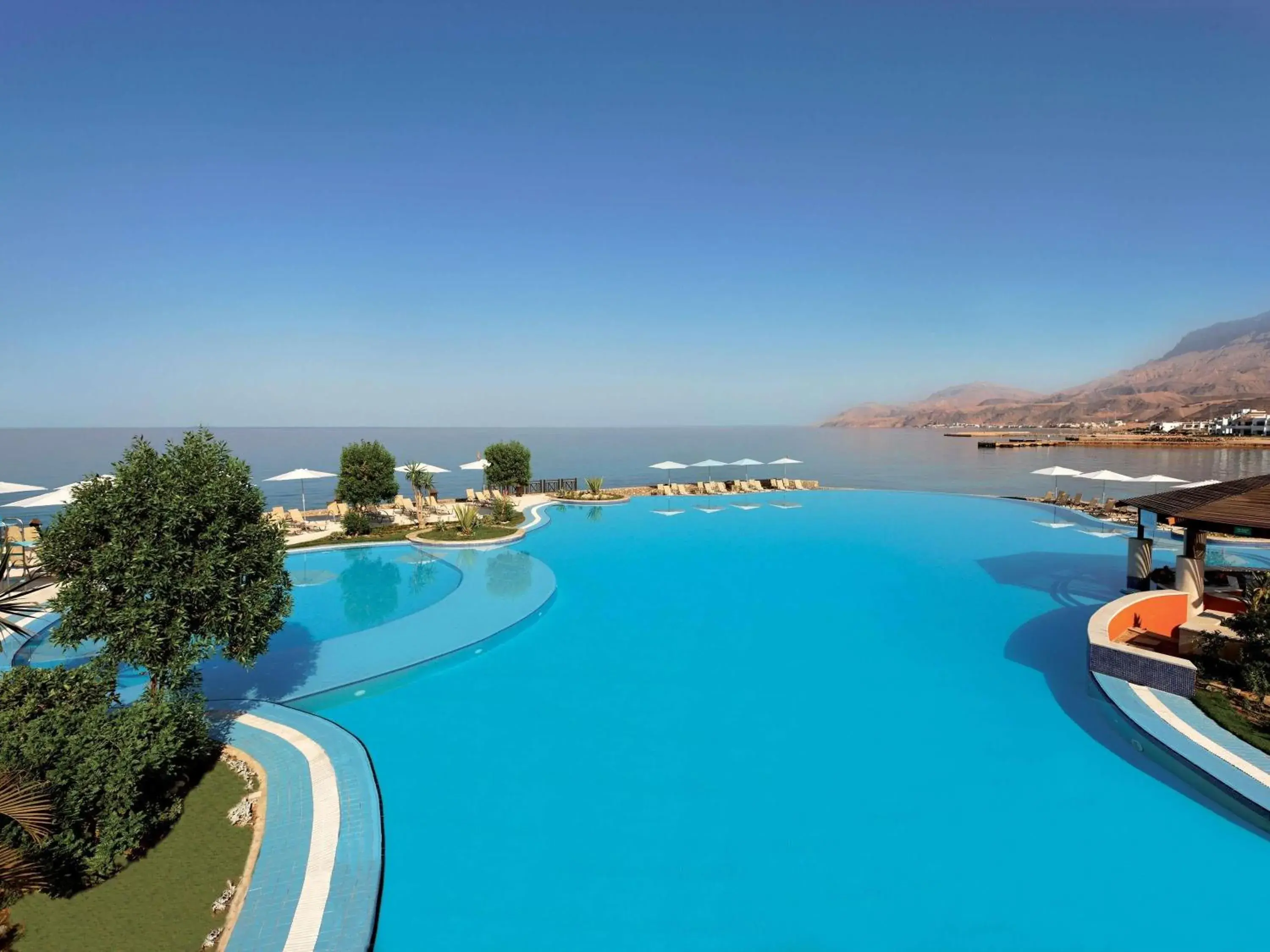 Pool view in Mövenpick Resort El Sokhna Pool view in Mövenpick Resort El Sokhna