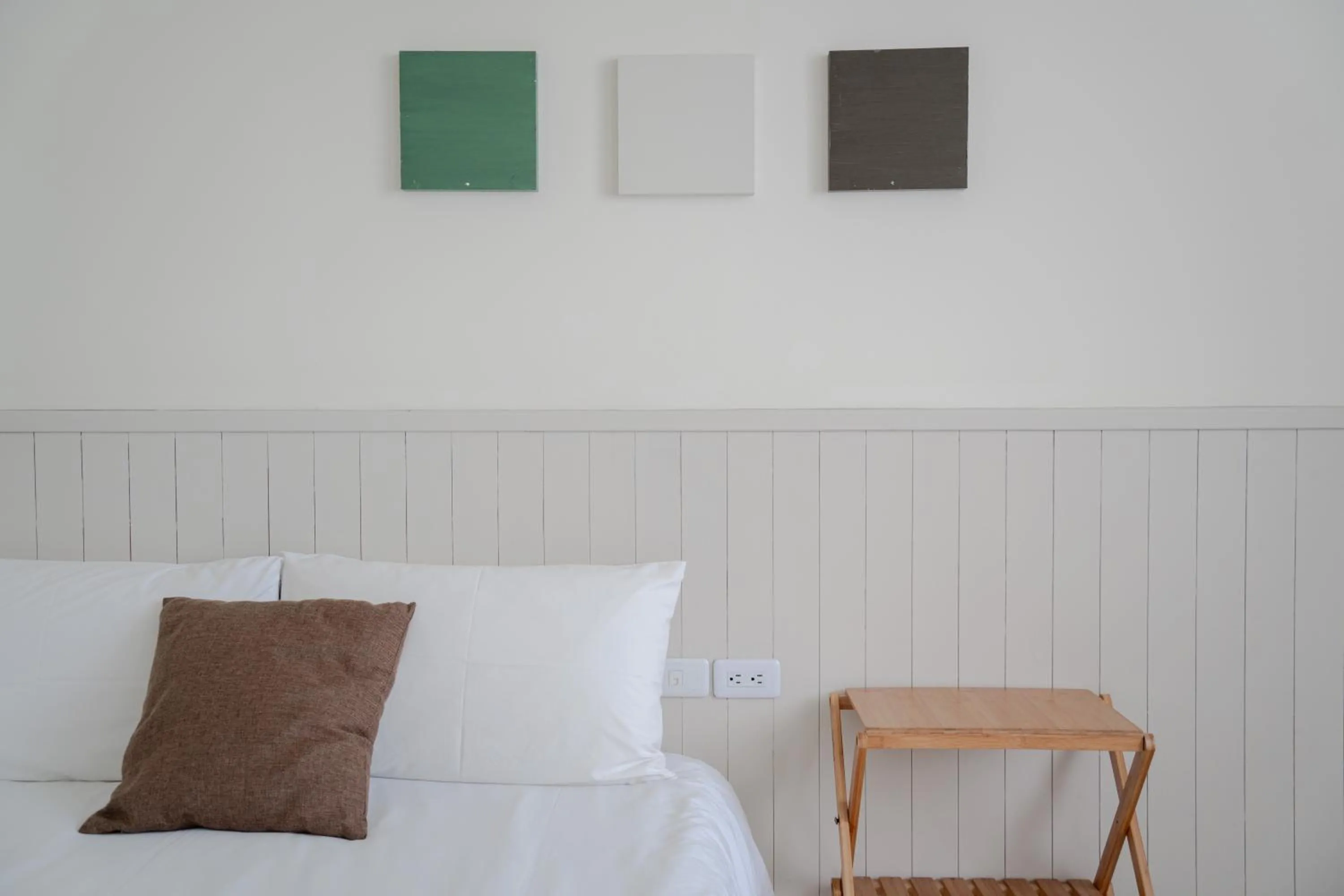 Bed in Cozy Green Guesthouse