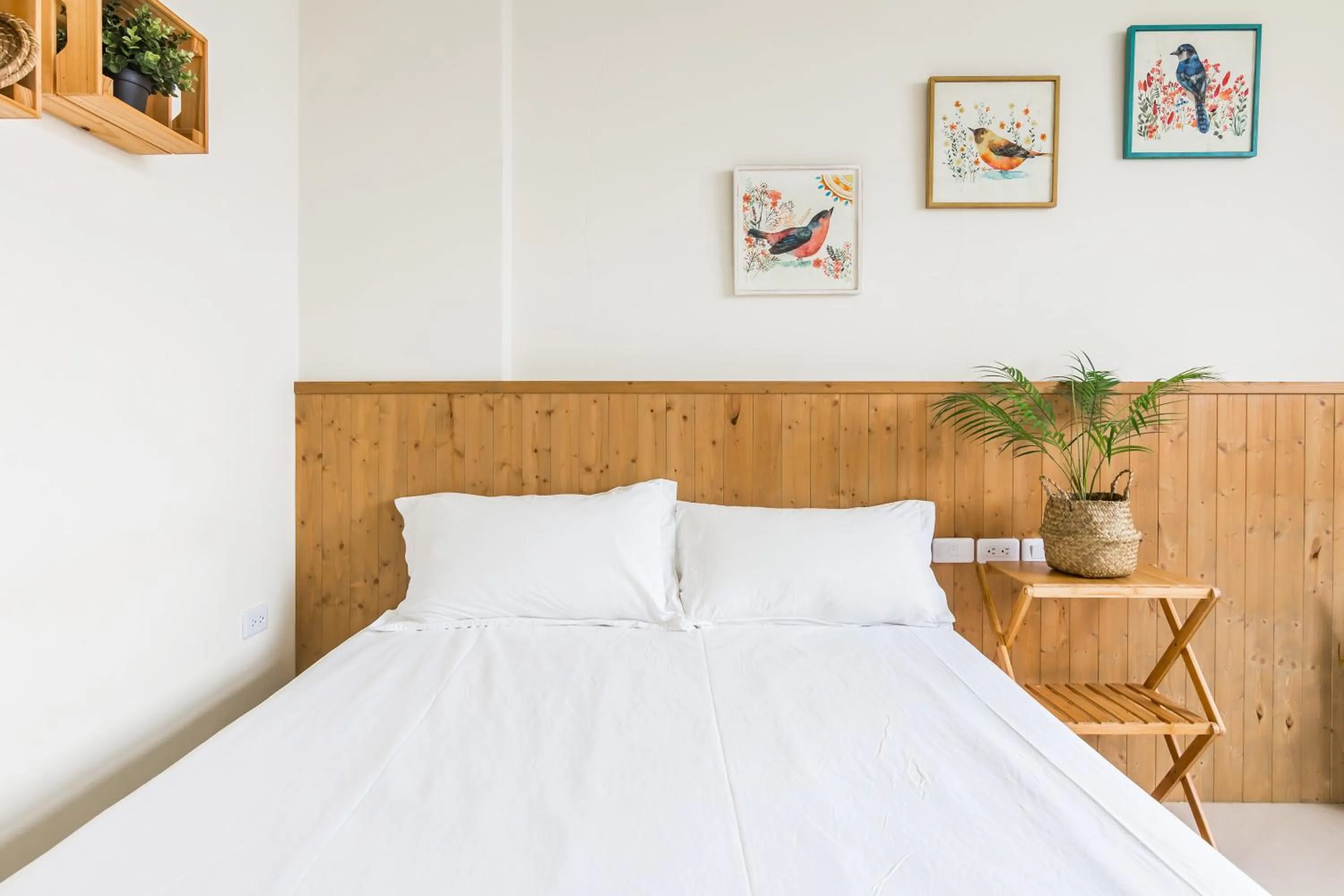 Bed in Cozy Green Guesthouse