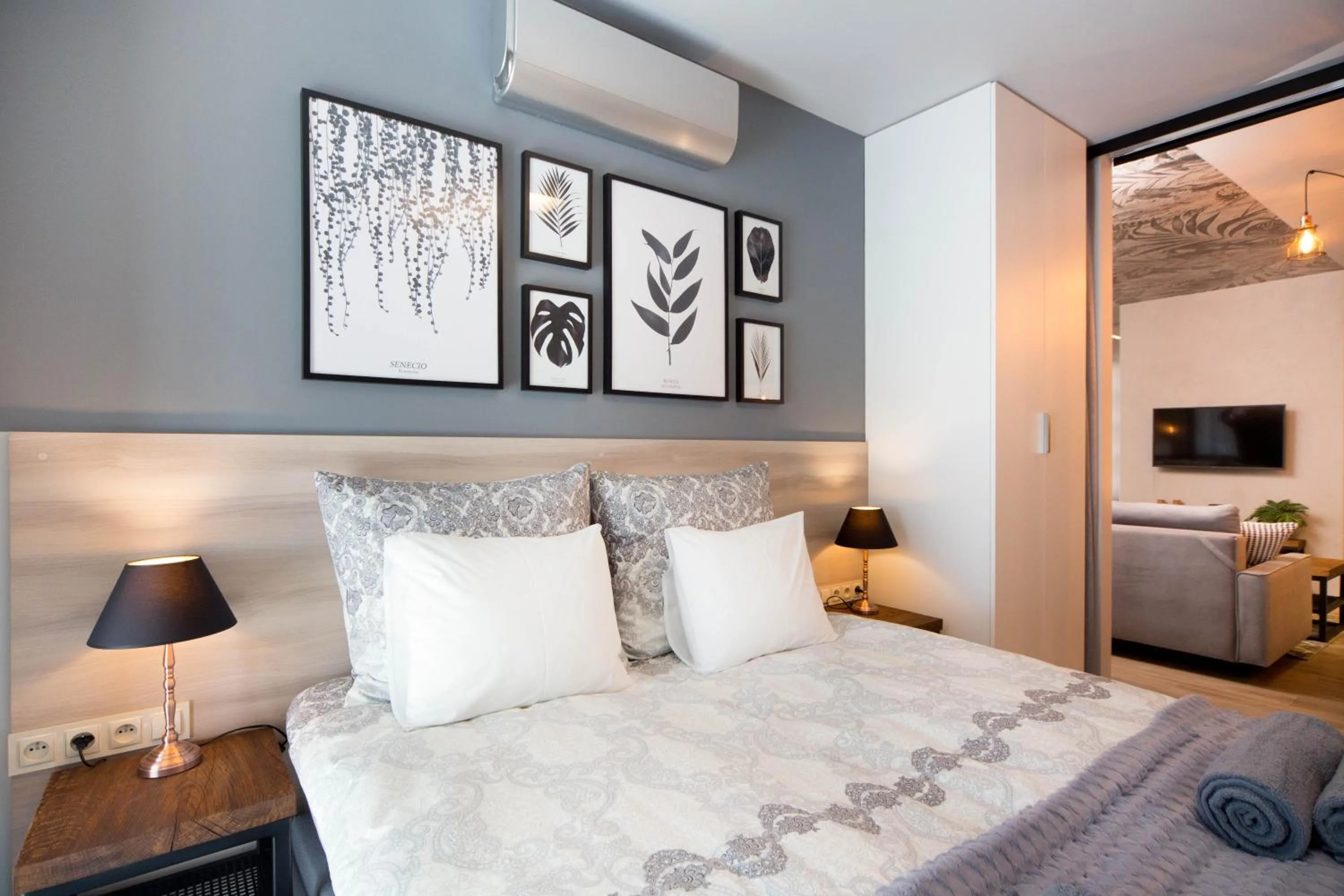 Bed in Jacuzzi Apartments