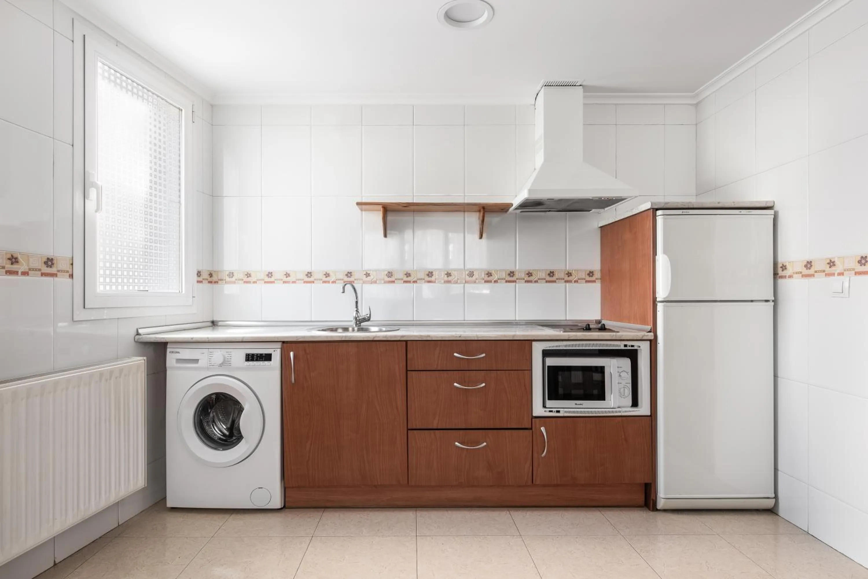 Kitchen or kitchenette in Apartamentos El Cid