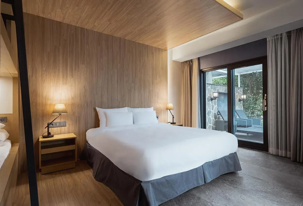 Bed in The Suites Hotel Jeju Bed in The Suites Hotel Jeju