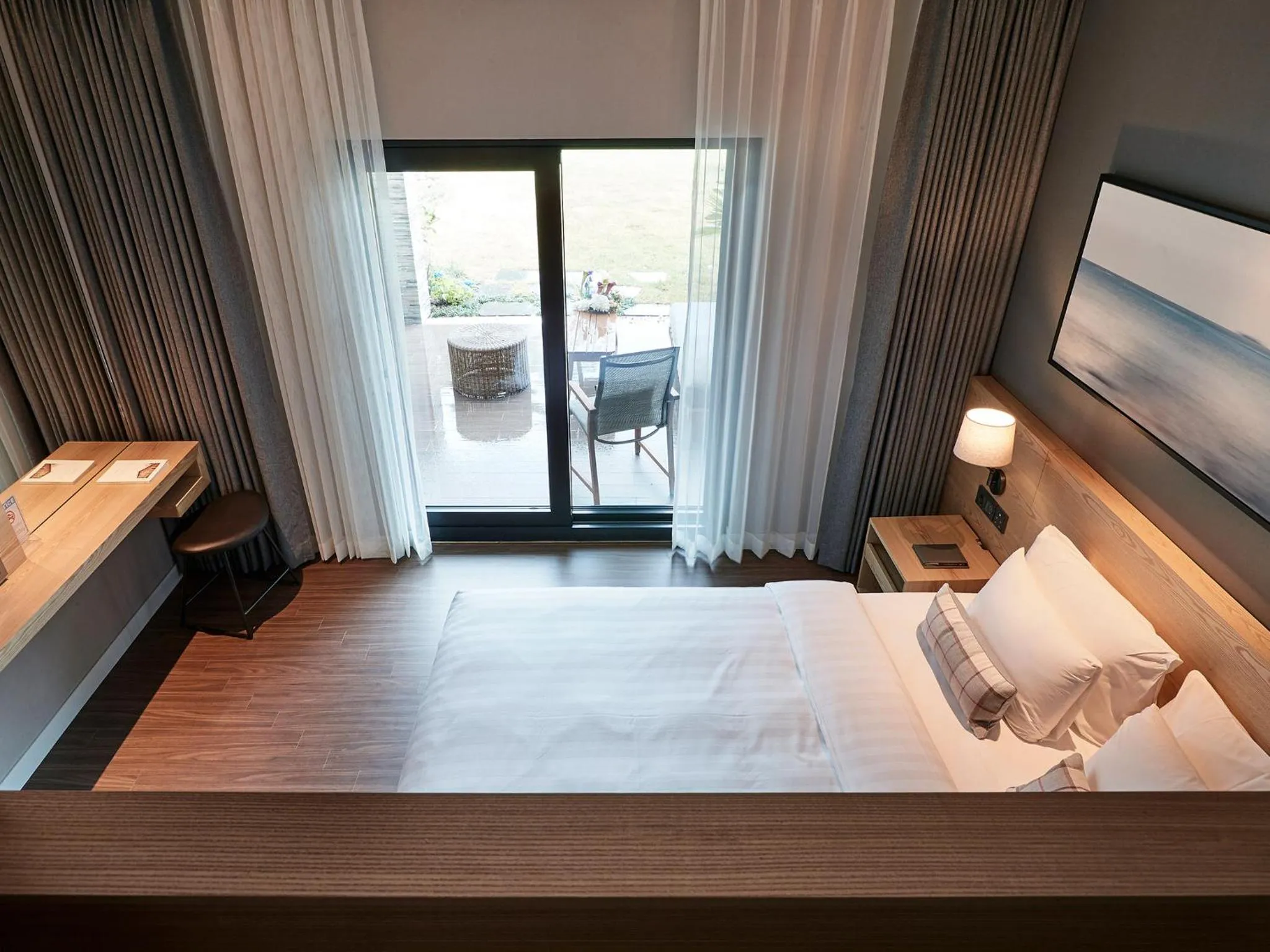 Bed in The Suites Hotel Jeju