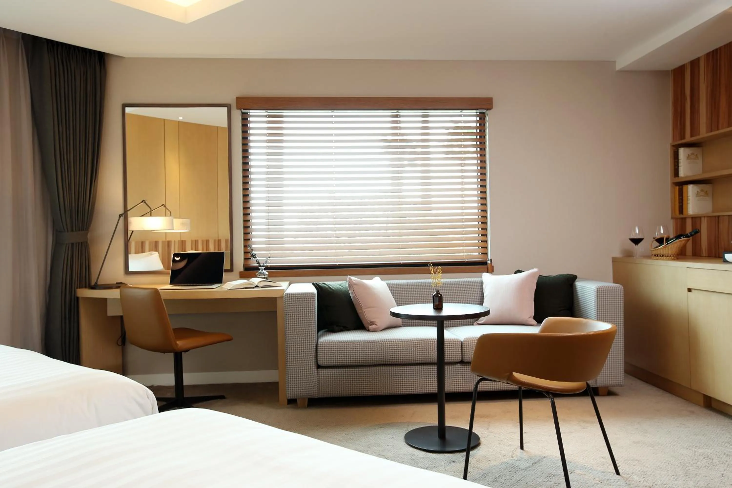 Bed in The Suites Hotel Jeju