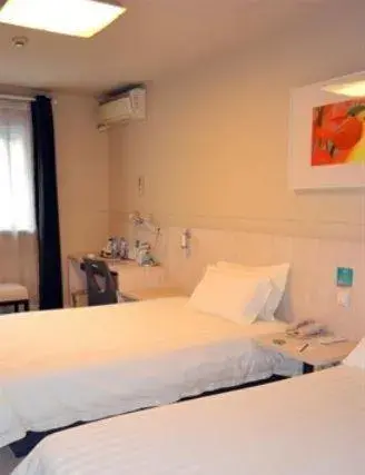 Bed in Jinjiang Inn - Chongqing Shopping & Entertainment Center Bed in Jinjiang Inn - Chongqing Shopping & Entertainment Center