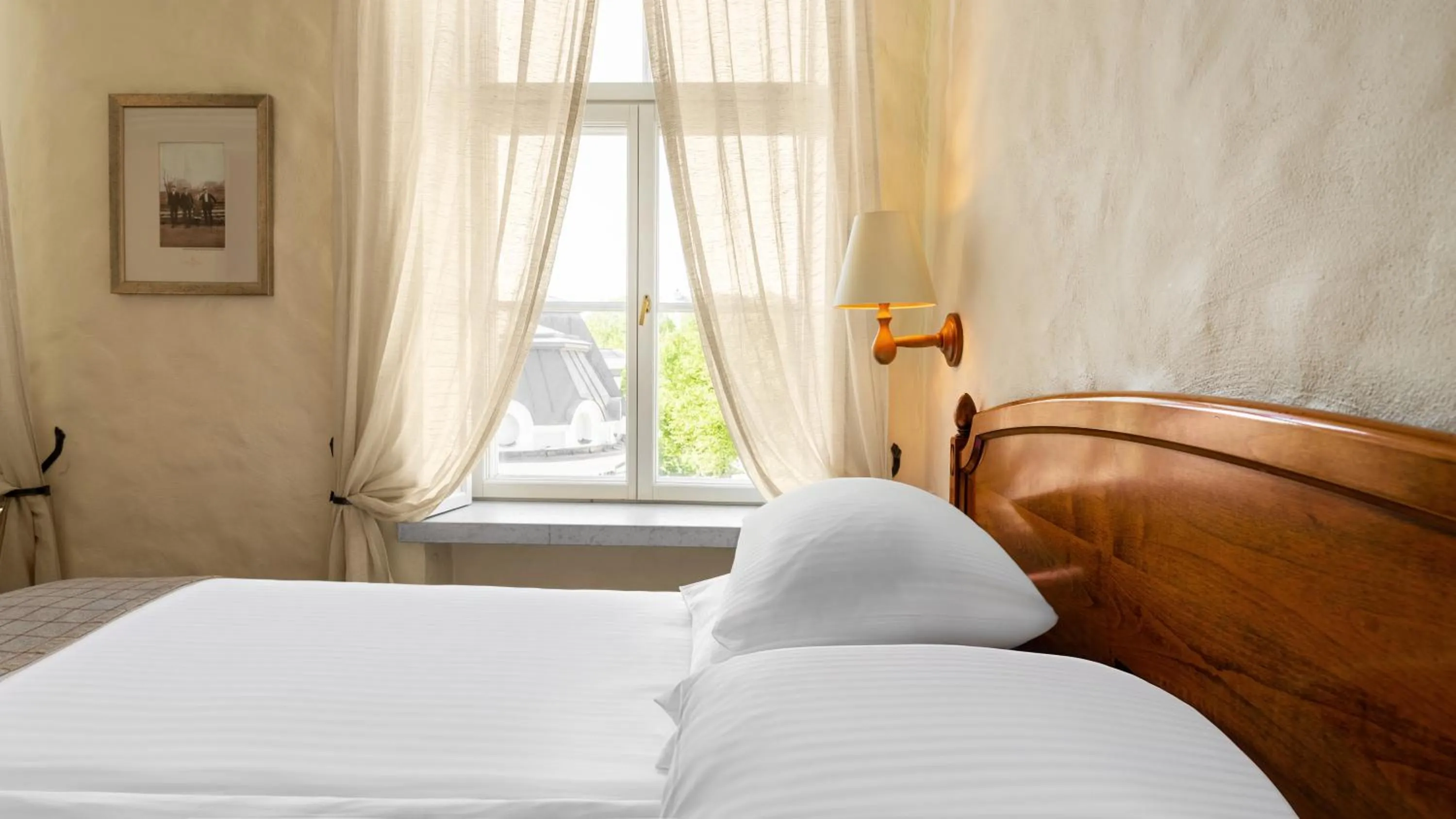 Bed in Rixwell Collection Savoy Boutique Hotel