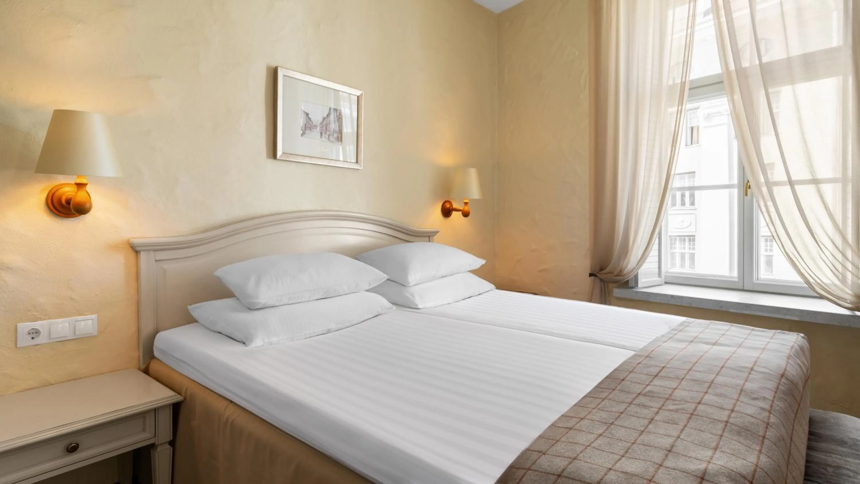 Bed in Rixwell Collection Savoy Boutique Hotel