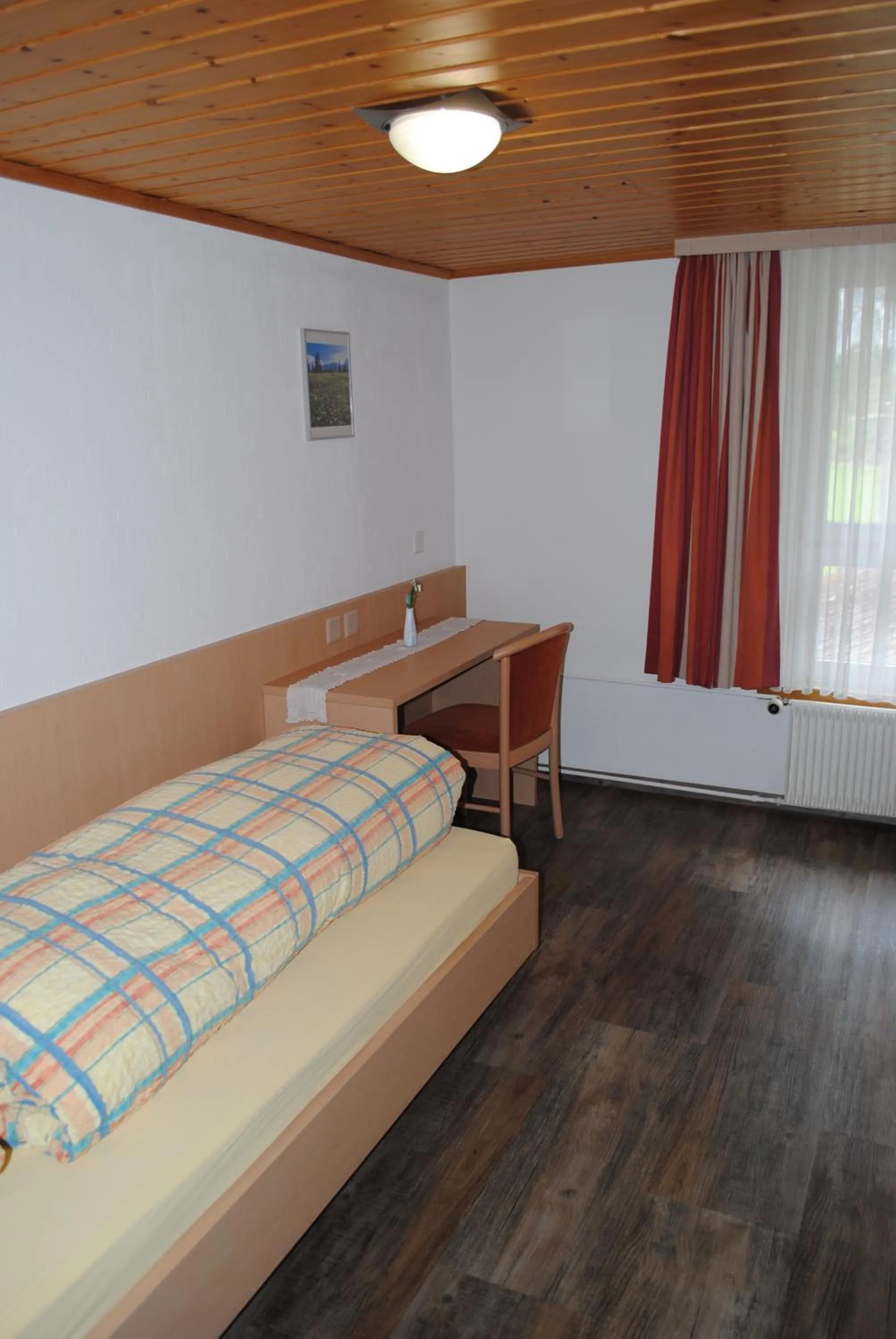 Bed in Hotel Des Alpes