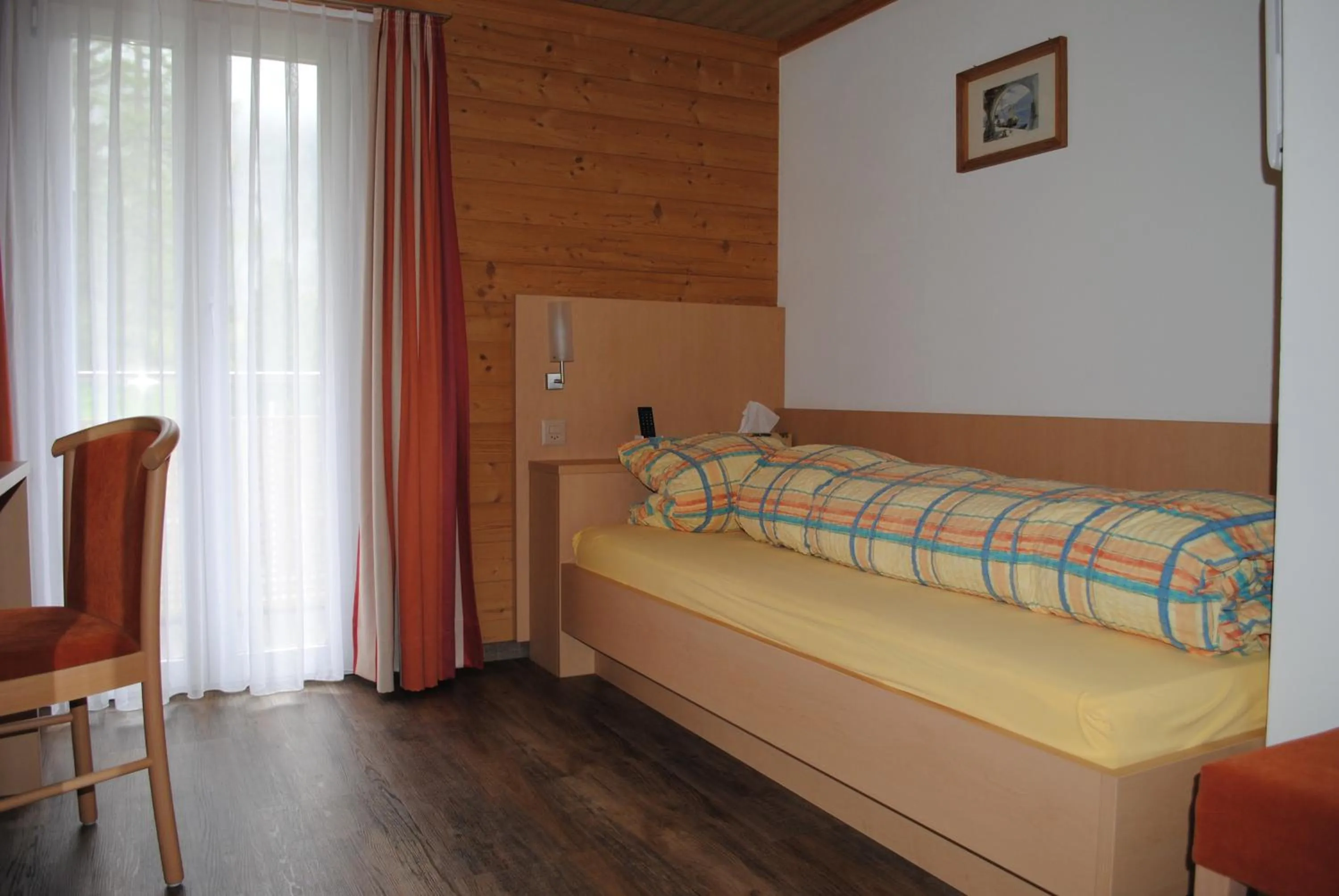 Bed in Hotel Des Alpes