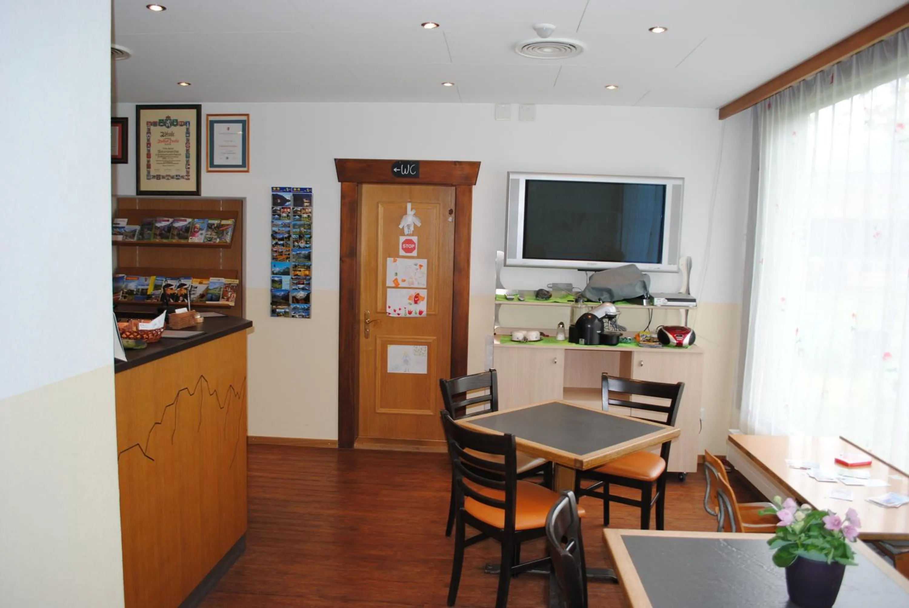 Lobby or reception in Hotel Des Alpes