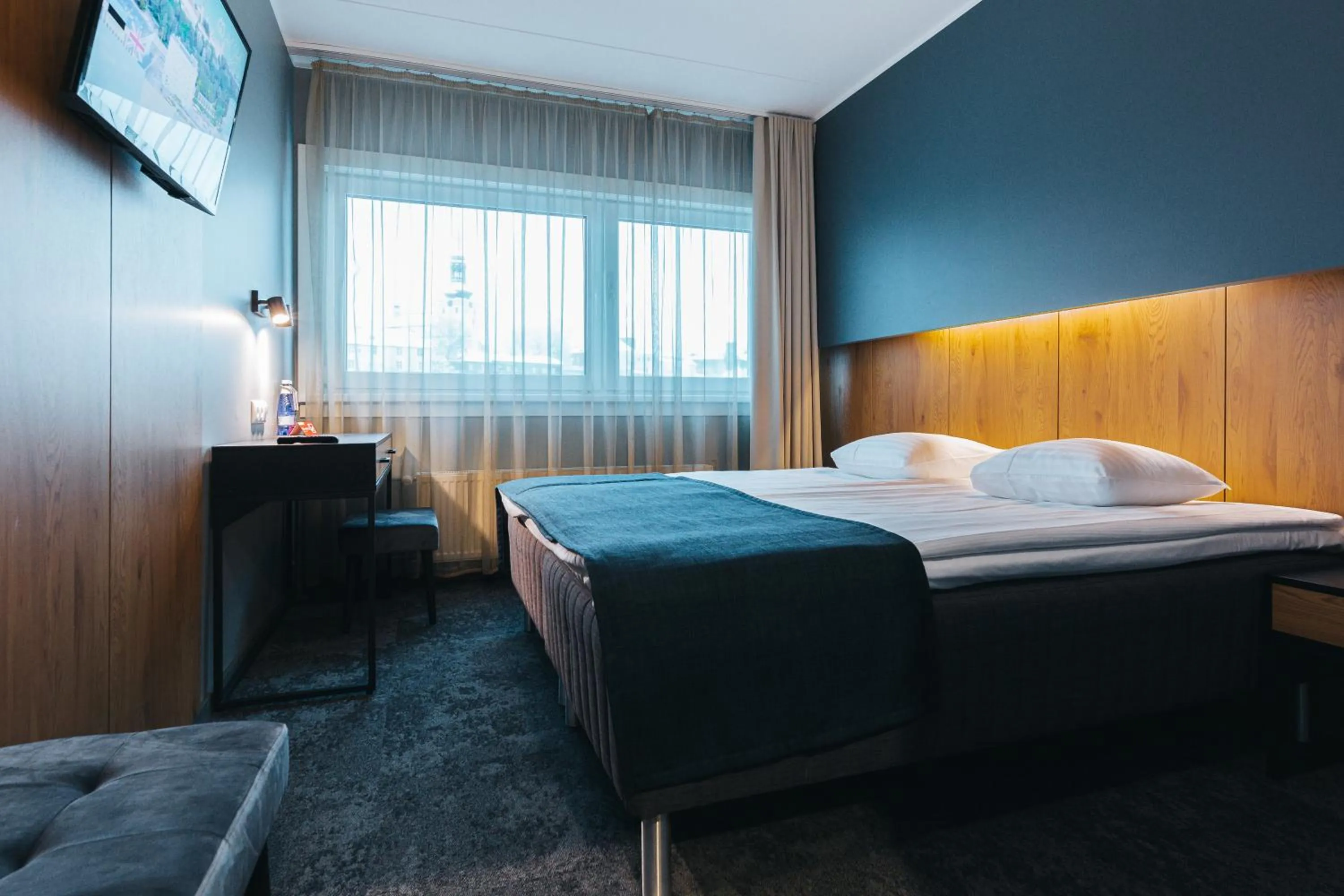 Bed in Go Hotel Shnelli