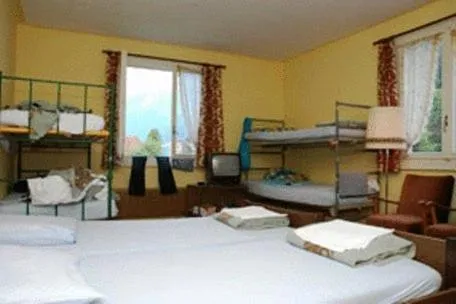 Bed in Funny Farm Backpackers