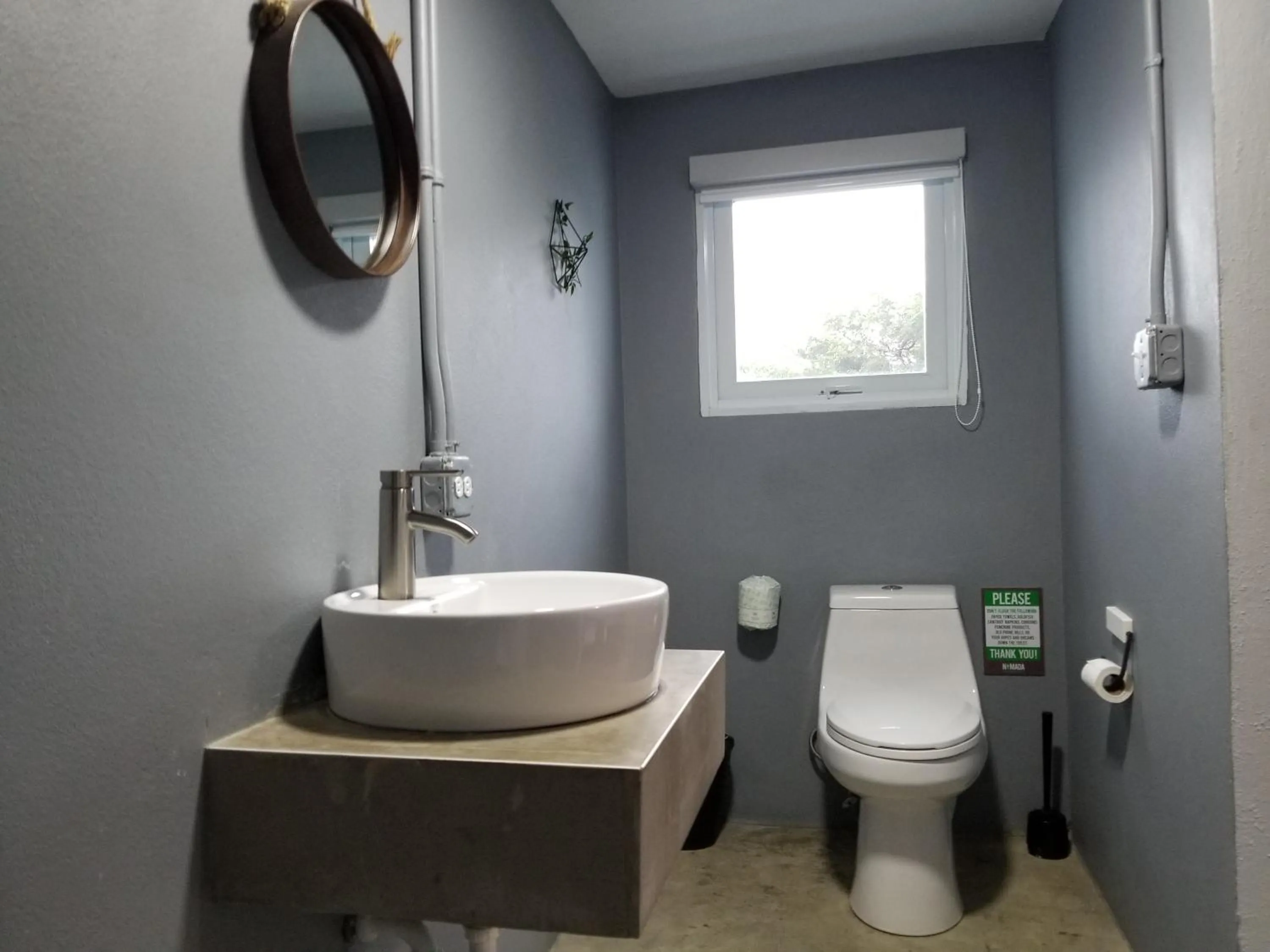 Toilet in Nomada Urban Beach Hostel- Calle Loiza