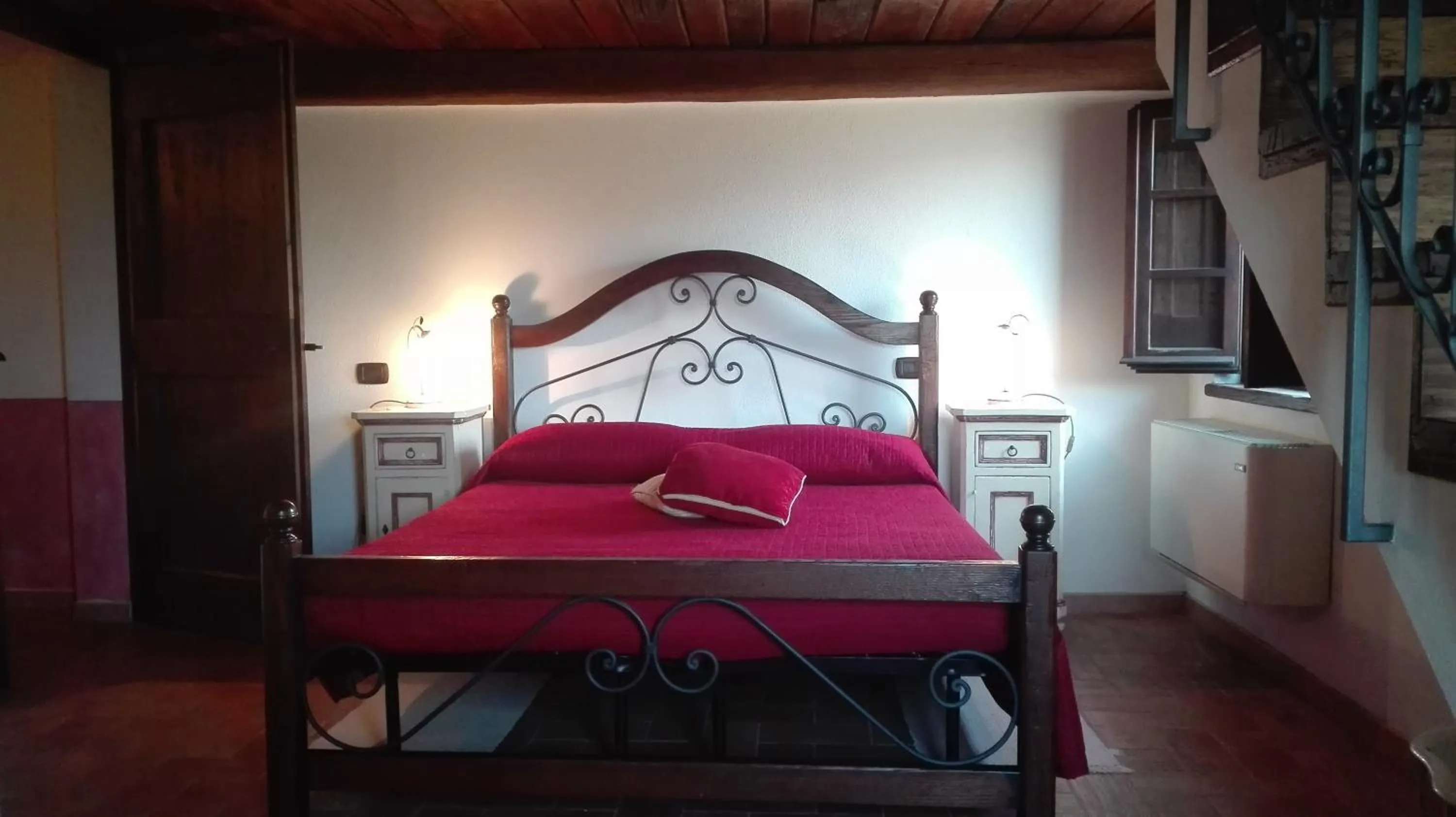 Bed in Terre Del Cantico Country House