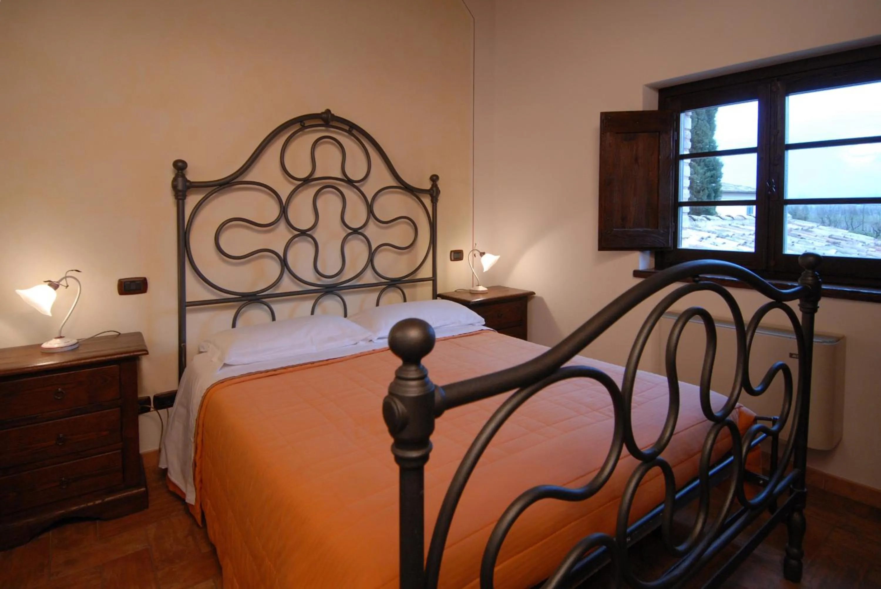 Bed in Terre Del Cantico Country House