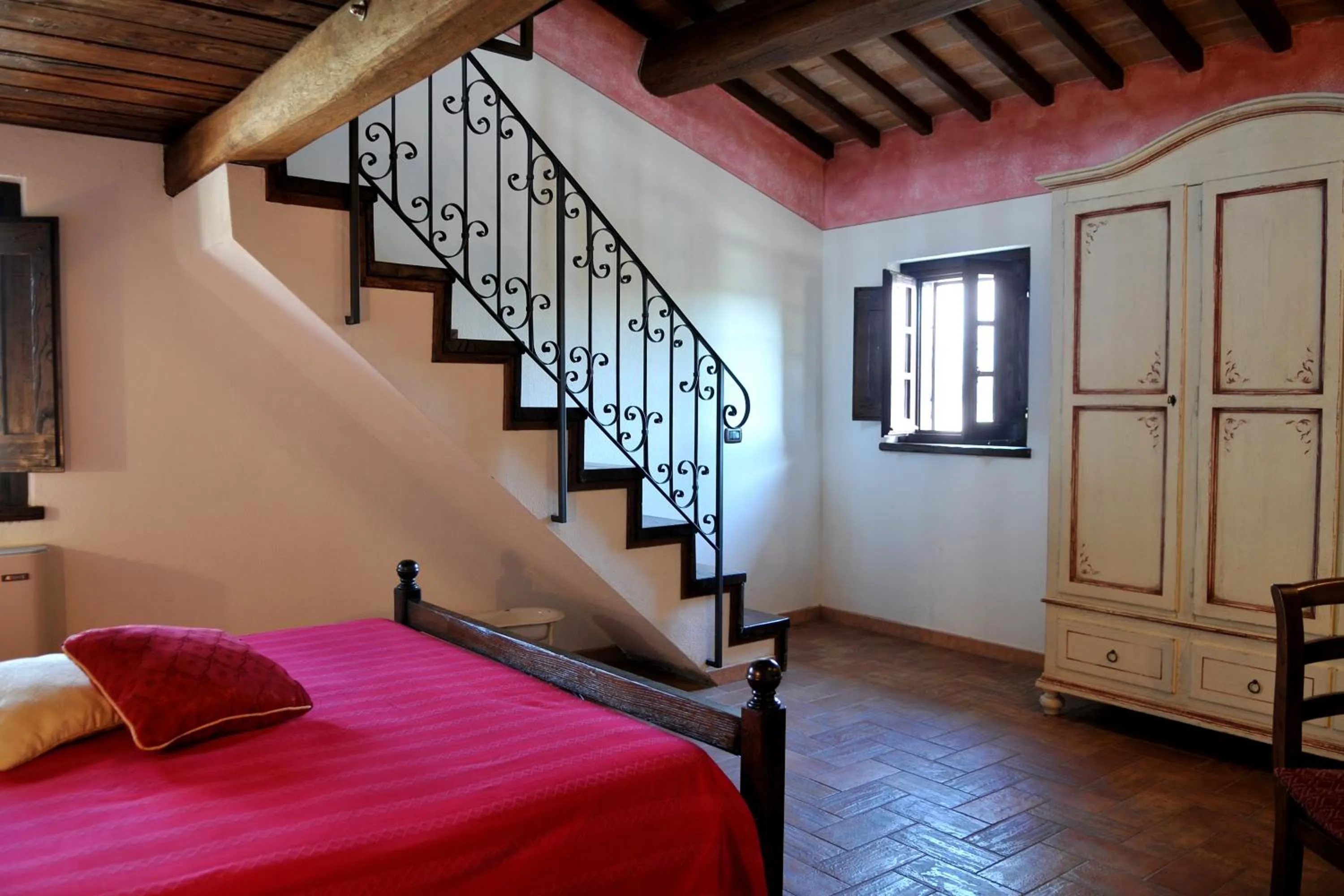 Bed in Terre Del Cantico Country House